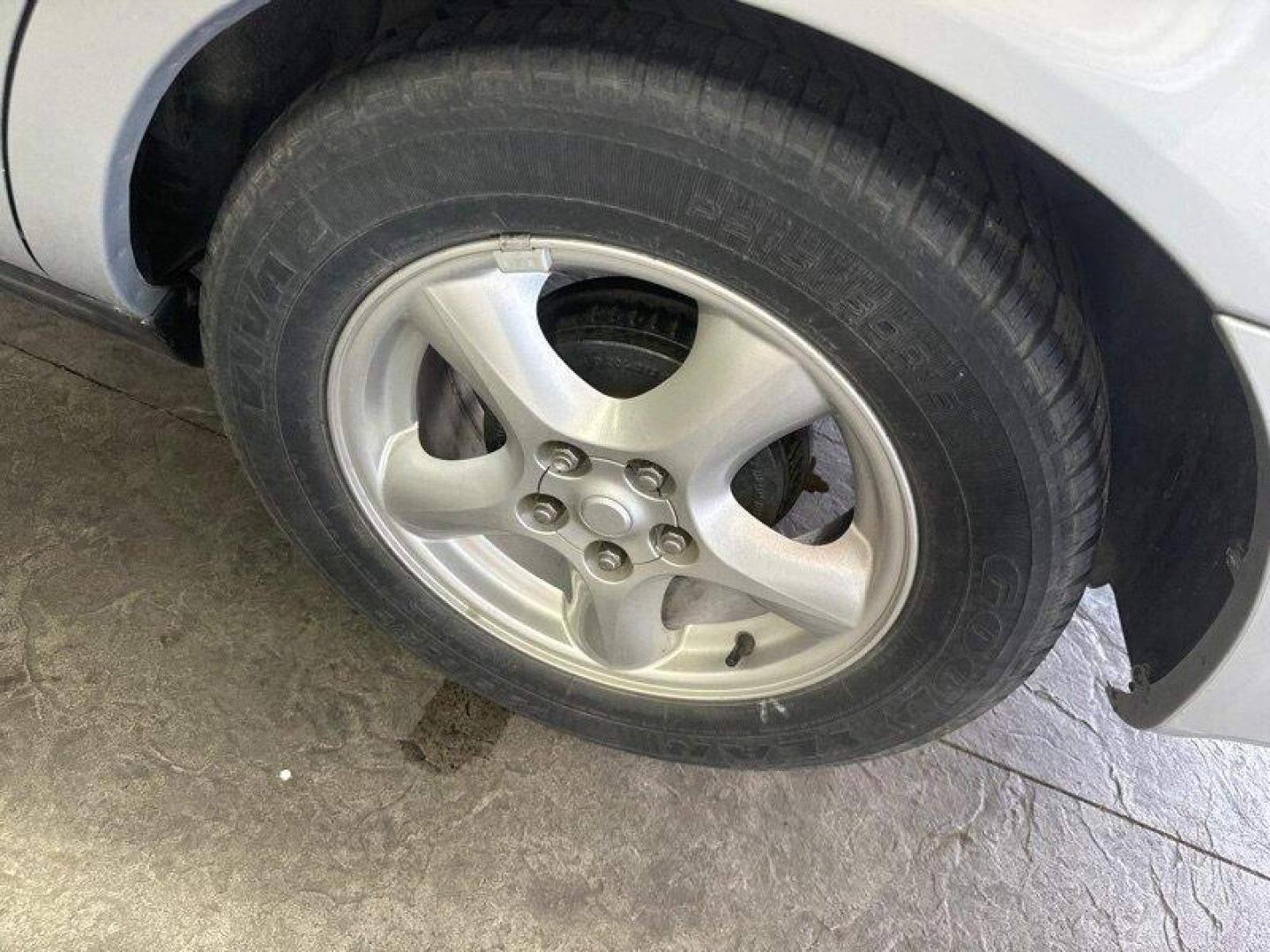 2003 Silver Frost Clearcoat Metallic Ford Taurus SES (1FAFP55U83A) with an 3.0L NA V6 overhead valves (OHV) 12V engine, Automatic transmission, located at 25355 Eames Street, Channahon, IL, 60410, (815) 467-1807, 41.429108, -88.228432 - Looking for a ride that's both stylish and practical? Look no further than this 2003 Ford Taurus SES! With its sleek design and powerful 3.0L NA V6 overhead valves (OHV) 12V engine, this baby is sure to turn heads. And with less than 59,000 miles on the odometer, you'll be cruising in style for year - Photo#11