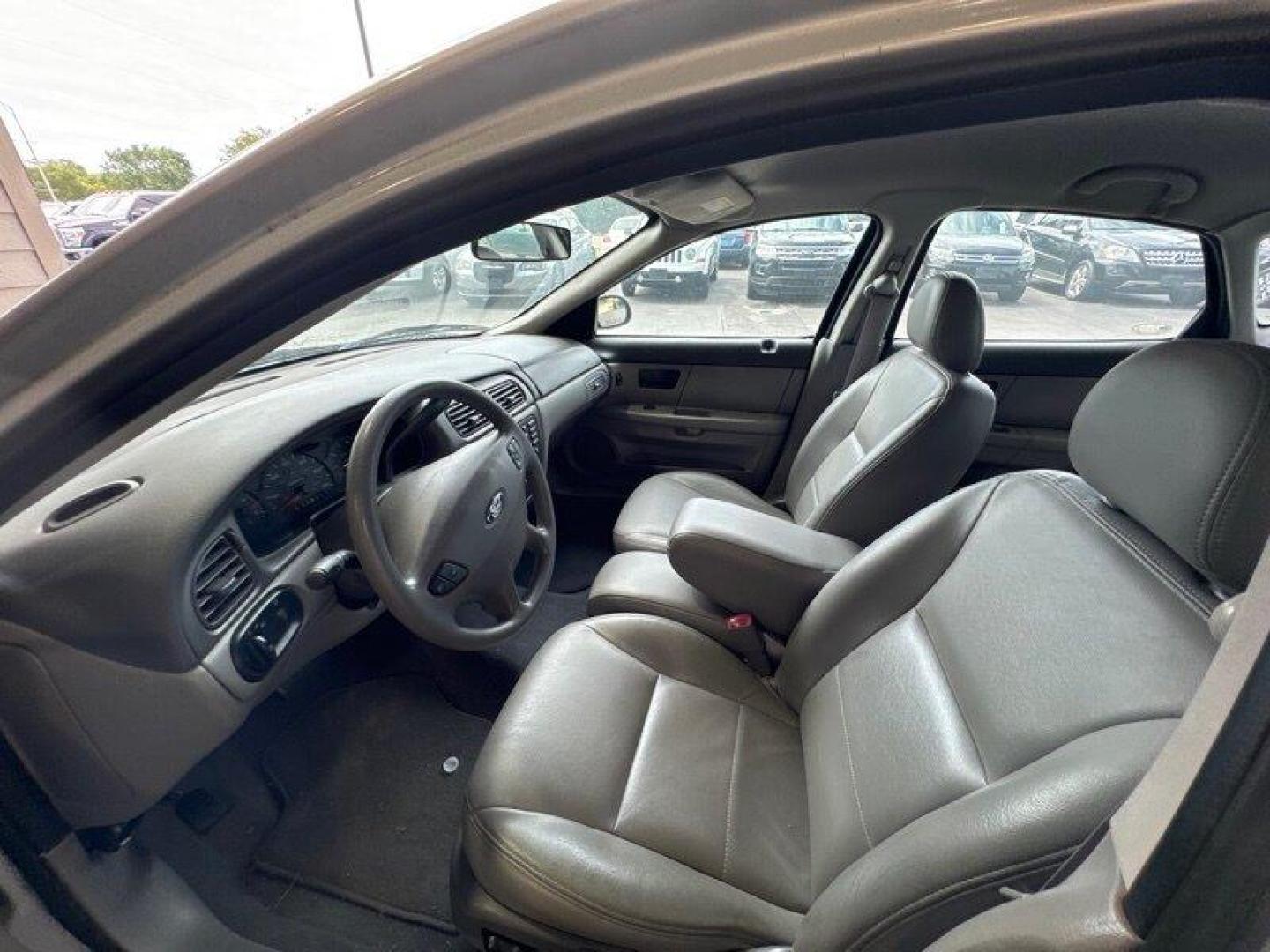 2003 Silver Frost Clearcoat Metallic Ford Taurus SES (1FAFP55U83A) with an 3.0L NA V6 overhead valves (OHV) 12V engine, Automatic transmission, located at 25355 Eames Street, Channahon, IL, 60410, (815) 467-1807, 41.429108, -88.228432 - Looking for a ride that's both stylish and practical? Look no further than this 2003 Ford Taurus SES! With its sleek design and powerful 3.0L NA V6 overhead valves (OHV) 12V engine, this baby is sure to turn heads. And with less than 59,000 miles on the odometer, you'll be cruising in style for year - Photo#13