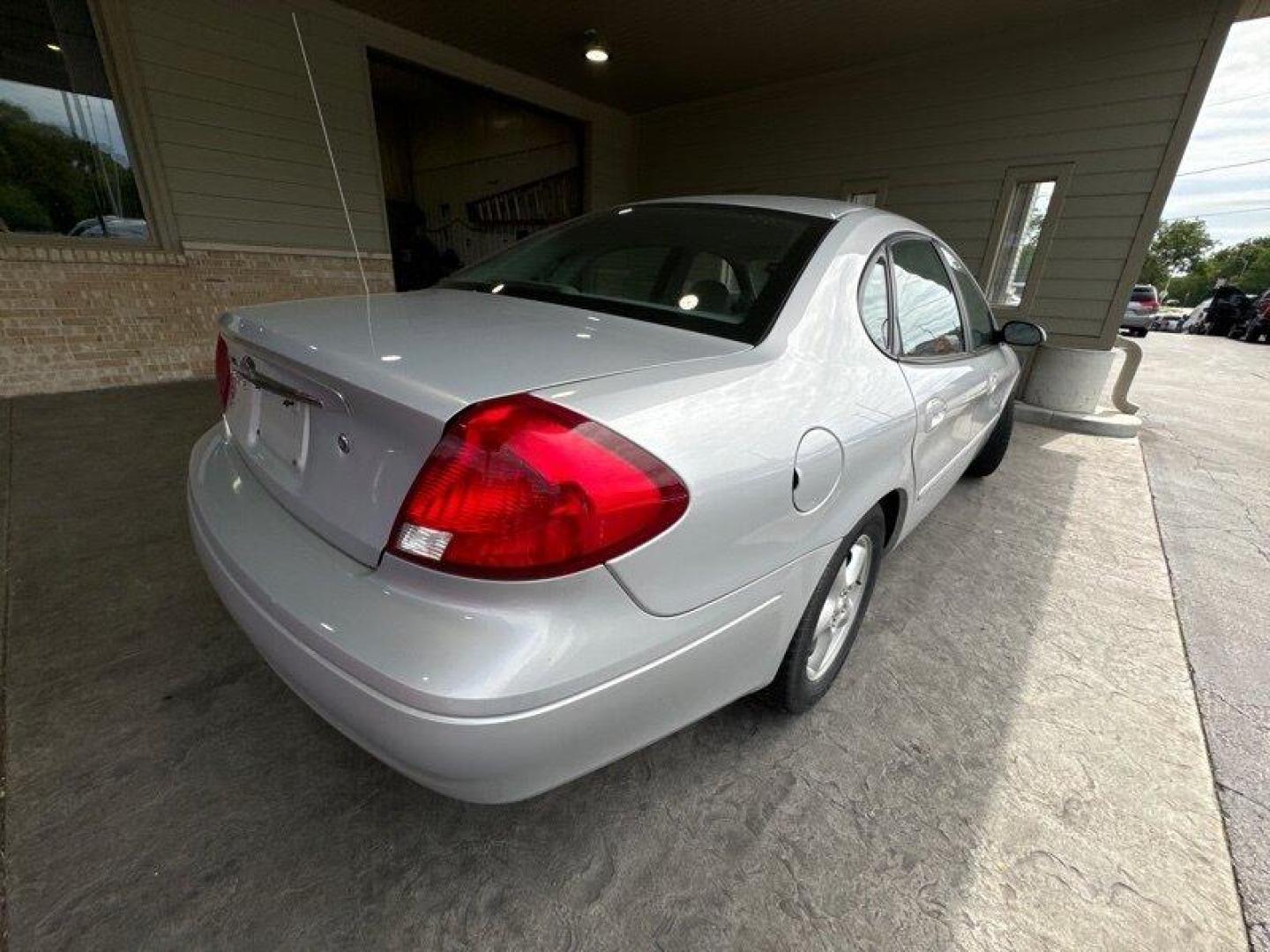 2003 Silver Frost Clearcoat Metallic Ford Taurus SES (1FAFP55U83A) with an 3.0L NA V6 overhead valves (OHV) 12V engine, Automatic transmission, located at 25355 Eames Street, Channahon, IL, 60410, (815) 467-1807, 41.429108, -88.228432 - Looking for a ride that's both stylish and practical? Look no further than this 2003 Ford Taurus SES! With its sleek design and powerful 3.0L NA V6 overhead valves (OHV) 12V engine, this baby is sure to turn heads. And with less than 59,000 miles on the odometer, you'll be cruising in style for year - Photo#3