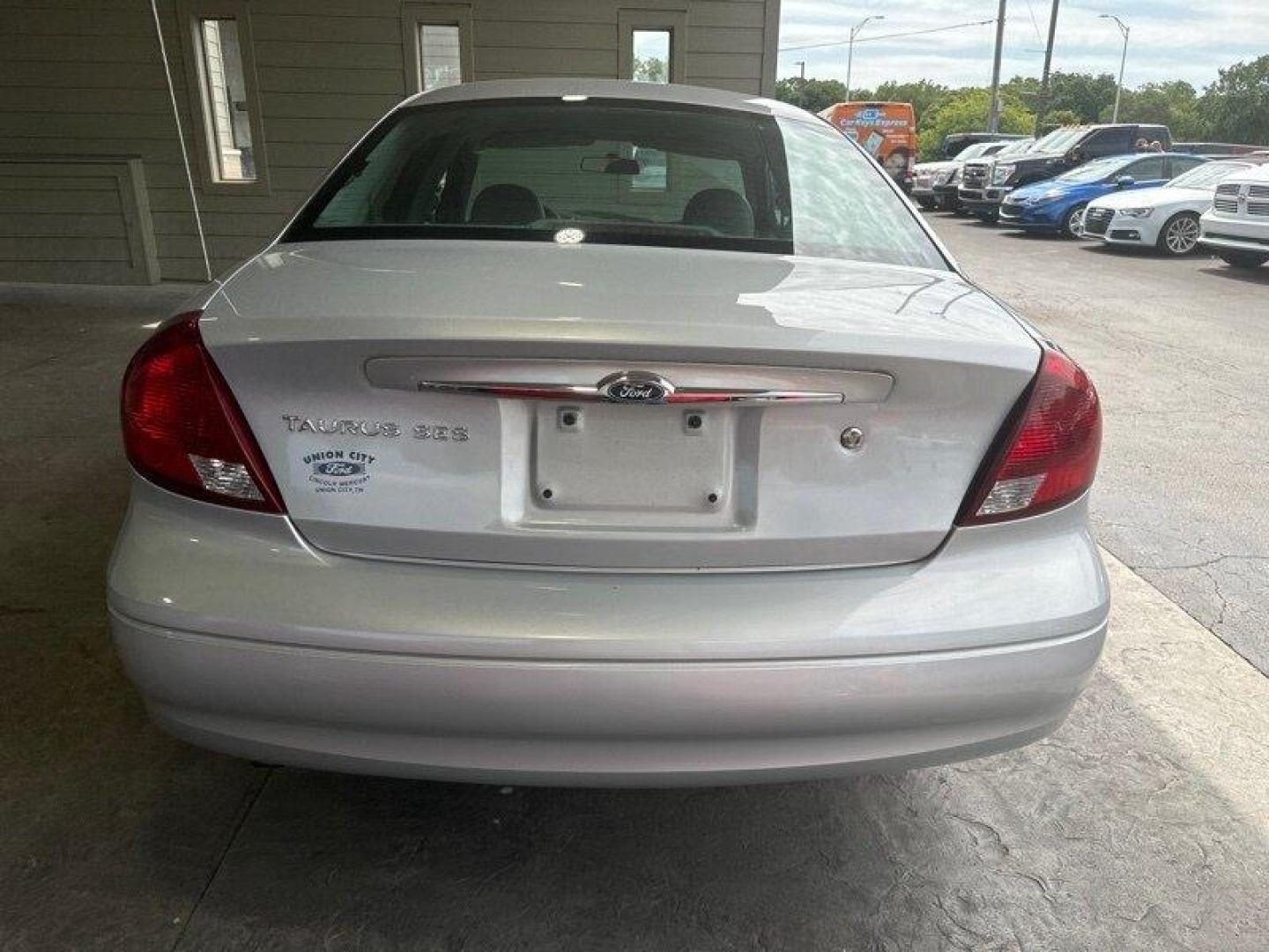 2003 Silver Frost Clearcoat Metallic Ford Taurus SES (1FAFP55U83A) with an 3.0L NA V6 overhead valves (OHV) 12V engine, Automatic transmission, located at 25355 Eames Street, Channahon, IL, 60410, (815) 467-1807, 41.429108, -88.228432 - Looking for a ride that's both stylish and practical? Look no further than this 2003 Ford Taurus SES! With its sleek design and powerful 3.0L NA V6 overhead valves (OHV) 12V engine, this baby is sure to turn heads. And with less than 59,000 miles on the odometer, you'll be cruising in style for year - Photo#4