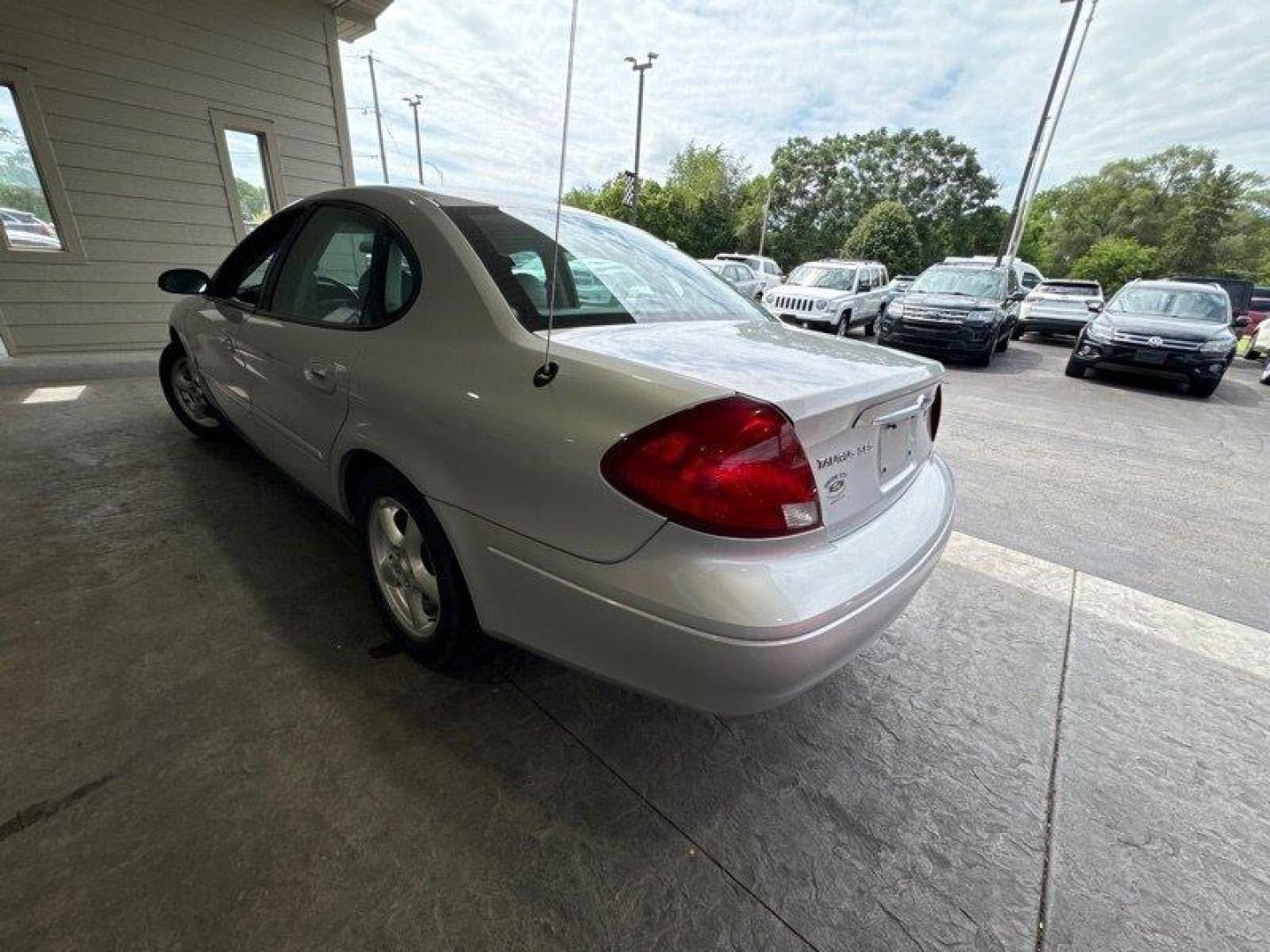 2003 Silver Frost Clearcoat Metallic Ford Taurus SES (1FAFP55U83A) with an 3.0L NA V6 overhead valves (OHV) 12V engine, Automatic transmission, located at 25355 Eames Street, Channahon, IL, 60410, (815) 467-1807, 41.429108, -88.228432 - Looking for a ride that's both stylish and practical? Look no further than this 2003 Ford Taurus SES! With its sleek design and powerful 3.0L NA V6 overhead valves (OHV) 12V engine, this baby is sure to turn heads. And with less than 59,000 miles on the odometer, you'll be cruising in style for year - Photo#5