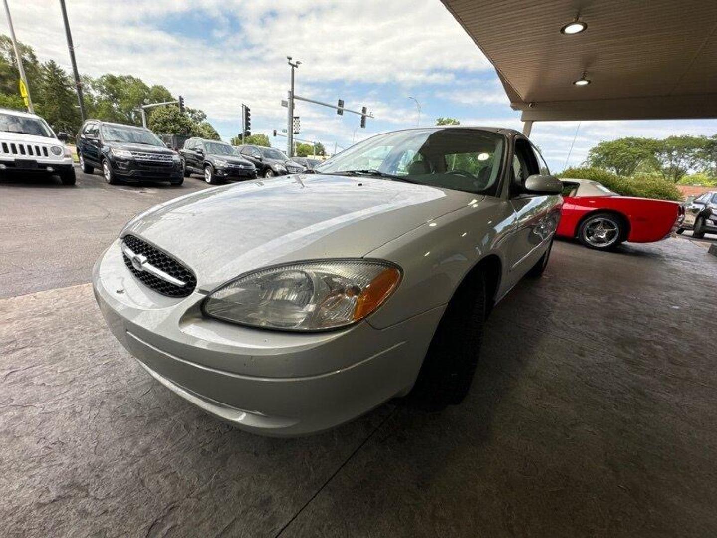 2003 Silver Frost Clearcoat Metallic Ford Taurus SES (1FAFP55U83A) with an 3.0L NA V6 overhead valves (OHV) 12V engine, Automatic transmission, located at 25355 Eames Street, Channahon, IL, 60410, (815) 467-1807, 41.429108, -88.228432 - Looking for a ride that's both stylish and practical? Look no further than this 2003 Ford Taurus SES! With its sleek design and powerful 3.0L NA V6 overhead valves (OHV) 12V engine, this baby is sure to turn heads. And with less than 59,000 miles on the odometer, you'll be cruising in style for year - Photo#7