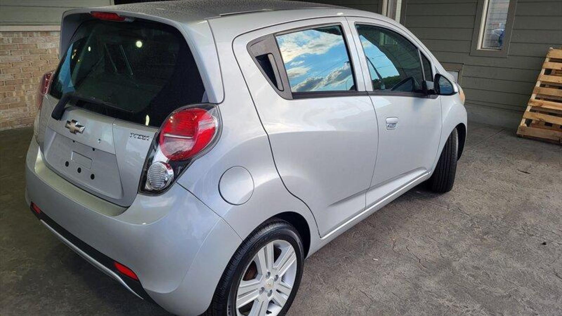 2014 Silver Ice Metallic Chevrolet Spark LS (KL8CB6S90EC) with an Ecotec 1.2L I4 84hp 83ft. lbs. engine, Automatic transmission, located at 25355 Eames Street, Channahon, IL, 60410, (815) 467-1807, 41.429108, -88.228432 - Introducing the 2014 Chevrolet Spark LS, a compact car that packs a punch! This stylish and economical vehicle is equipped with a powerful Ecotec 1.2L I4 engine that delivers an impressive 84 horsepower and 83 ft. lbs. of torque. With less than 66,000 miles on the odometer, this car has been meticul - Photo#3