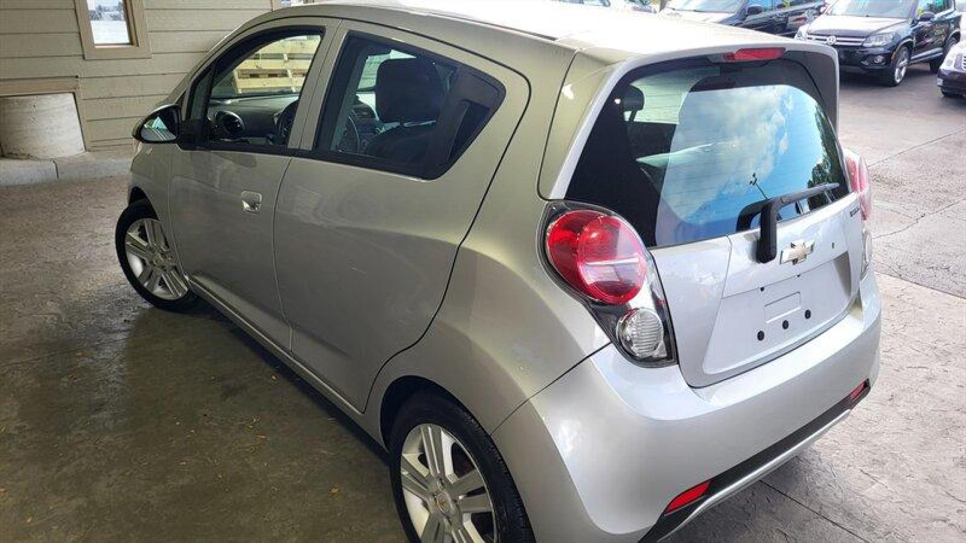 2014 Silver Ice Metallic Chevrolet Spark LS (KL8CB6S90EC) with an Ecotec 1.2L I4 84hp 83ft. lbs. engine, Automatic transmission, located at 25355 Eames Street, Channahon, IL, 60410, (815) 467-1807, 41.429108, -88.228432 - Introducing the 2014 Chevrolet Spark LS, a compact car that packs a punch! This stylish and economical vehicle is equipped with a powerful Ecotec 1.2L I4 engine that delivers an impressive 84 horsepower and 83 ft. lbs. of torque. With less than 66,000 miles on the odometer, this car has been meticul - Photo#5