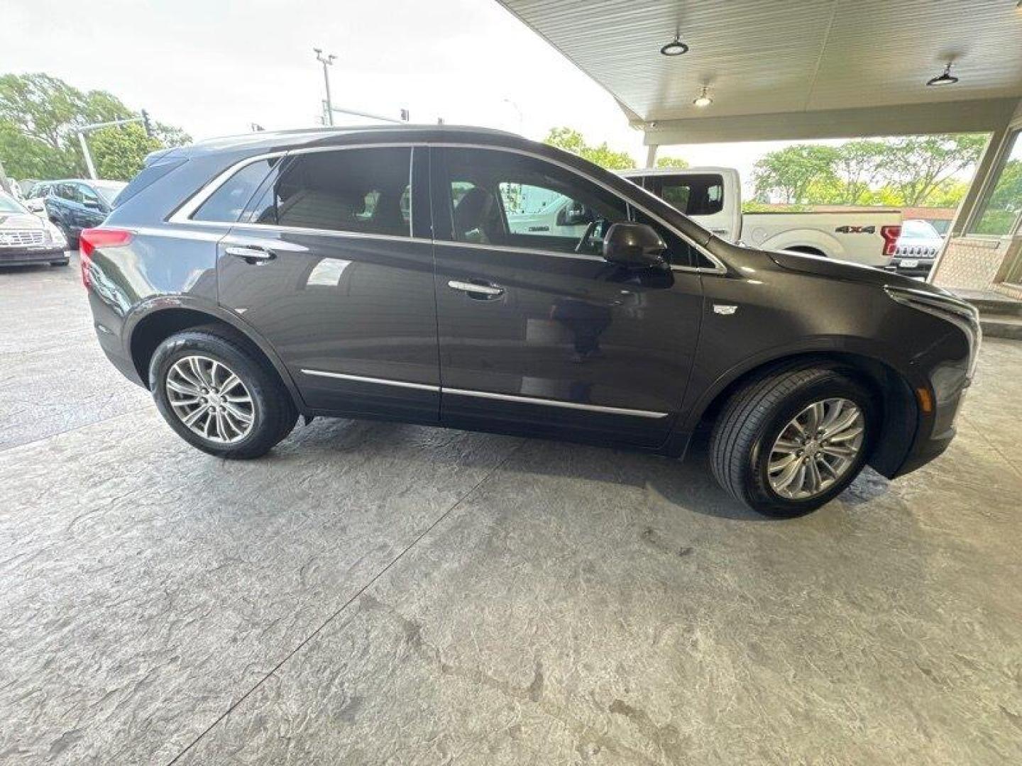 2017 Dark Granite Metallic Cadillac XT5 Luxury (1GYKNBRS3HZ) with an 3.6L V6 310hp 271ft. lbs. engine, Automatic transmission, located at 25355 Eames Street, Channahon, IL, 60410, (815) 467-1807, 41.429108, -88.228432 - Looking for a ride that's luxurious, powerful, and efficient all at once? Well, look no further than the 2017 Cadillac XT5 Luxury! This baby is powered by a 3.6L V6 engine that'll give you a whopping 310 horses to play with, and 271ft. lbs. of torque to keep you glued to the road. But wait, there' - Photo#1