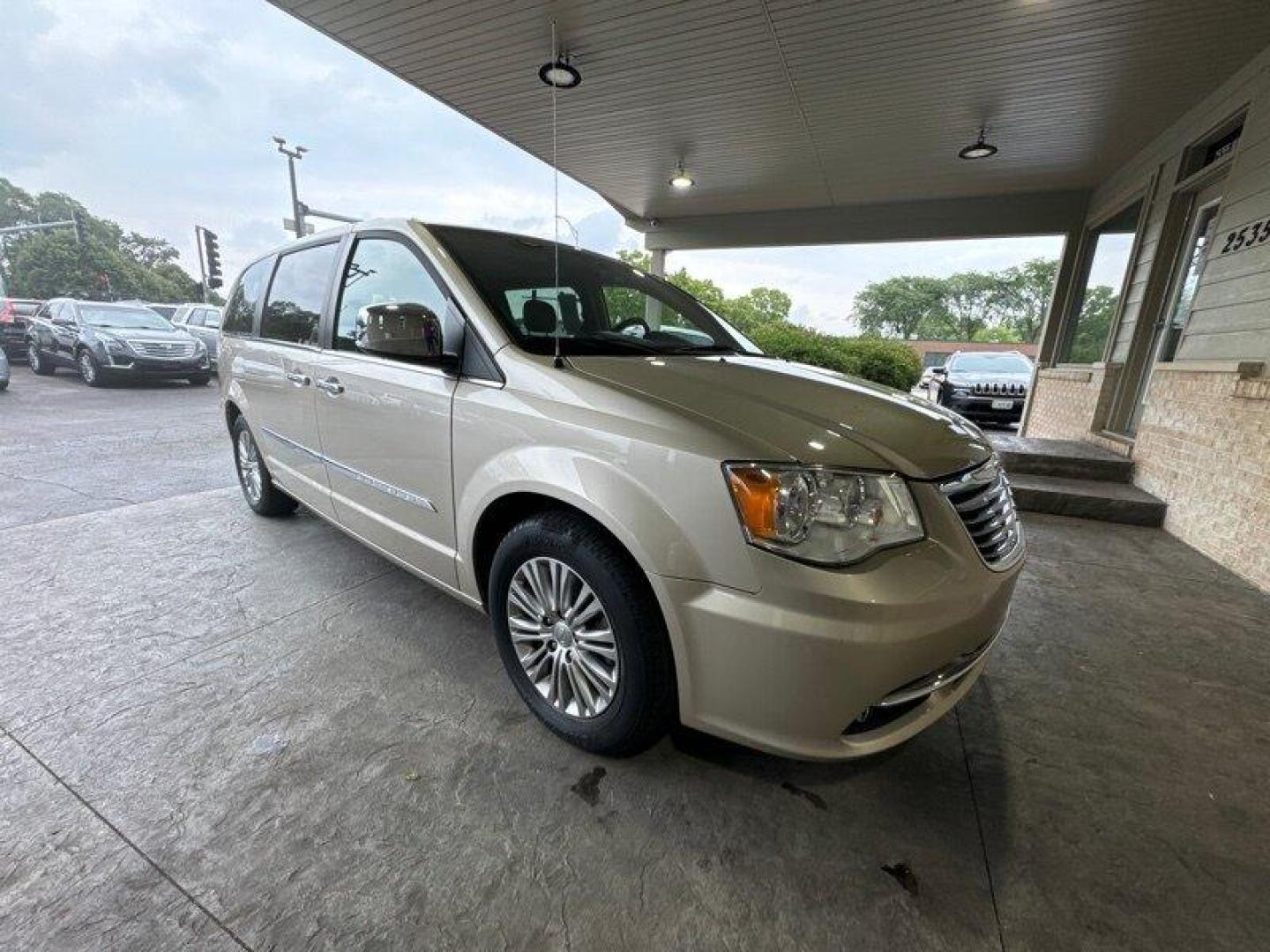 2016 Tan Chrysler Town and Country Touring-L (2C4RC1CG2GR) with an Pentastar 3.6L Flex Fuel V6 283hp 260ft. lbs. engine, Automatic transmission, located at 25355 Eames Street, Channahon, IL, 60410, (815) 467-1807, 41.429108, -88.228432 - Looking for a van that can do it all? Look no further than the 2016 Chrysler Town and Country Touring-L! This powerhouse is powered by a Pentastar 3.6L Flex Fuel V6 engine that delivers a whopping 283 horsepower and 260 ft-lbs of torque. But it's not just the engine that makes the Town and Cou - Photo#0