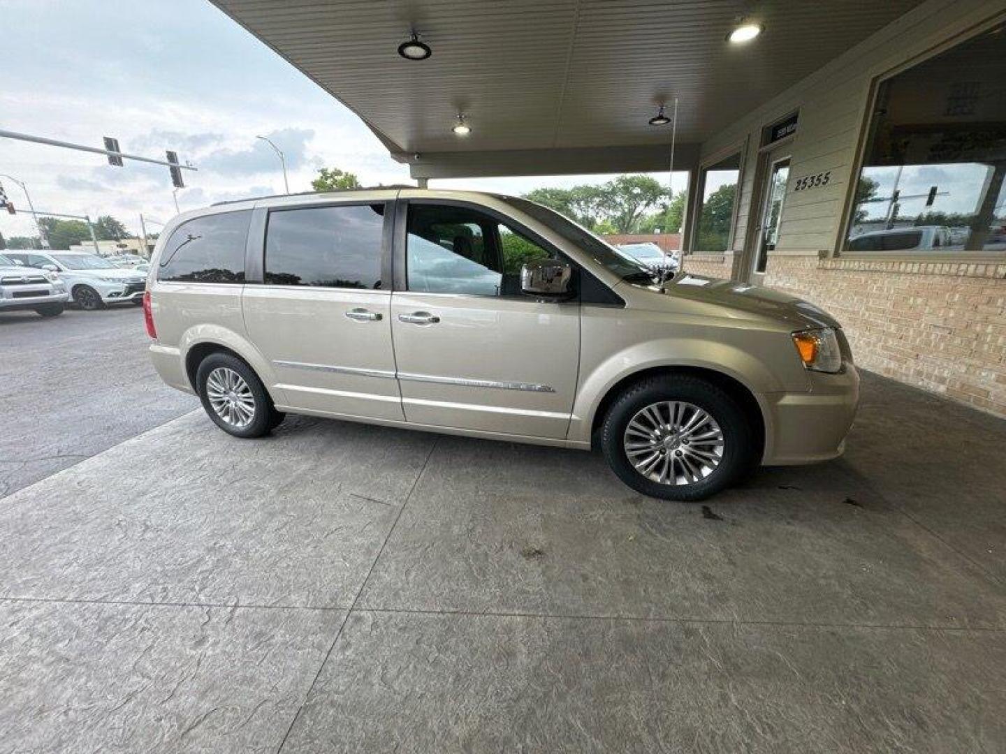 2016 Tan Chrysler Town and Country Touring-L (2C4RC1CG2GR) with an Pentastar 3.6L Flex Fuel V6 283hp 260ft. lbs. engine, Automatic transmission, located at 25355 Eames Street, Channahon, IL, 60410, (815) 467-1807, 41.429108, -88.228432 - Looking for a van that can do it all? Look no further than the 2016 Chrysler Town and Country Touring-L! This powerhouse is powered by a Pentastar 3.6L Flex Fuel V6 engine that delivers a whopping 283 horsepower and 260 ft-lbs of torque. But it's not just the engine that makes the Town and Cou - Photo#1