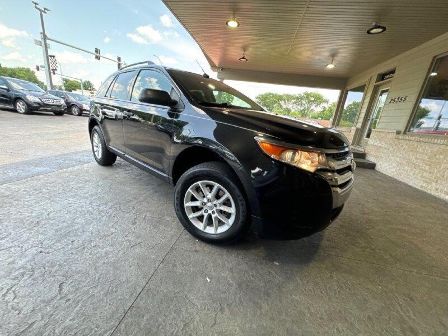 2013 Tuxedo Black Metallic Ford Edge SE (2FMDK3GC7DB) with an 3.5L V6 285hp 253ft. lbs. engine, Automatic transmission, located at 25355 Eames Street, Channahon, IL, 60410, (815) 467-1807, 41.429108, -88.228432 - Introducing the 2013 Ford Edge SE! This incredible SUV is powered by a 3.5L V6 engine, producing an impressive 285 horsepower and 253ft. lbs. of torque. With less than 97,000 miles on the odometer and averaging less than 9,000 miles per year, this vehicle is in fantastic condition and ready to take - Photo#0