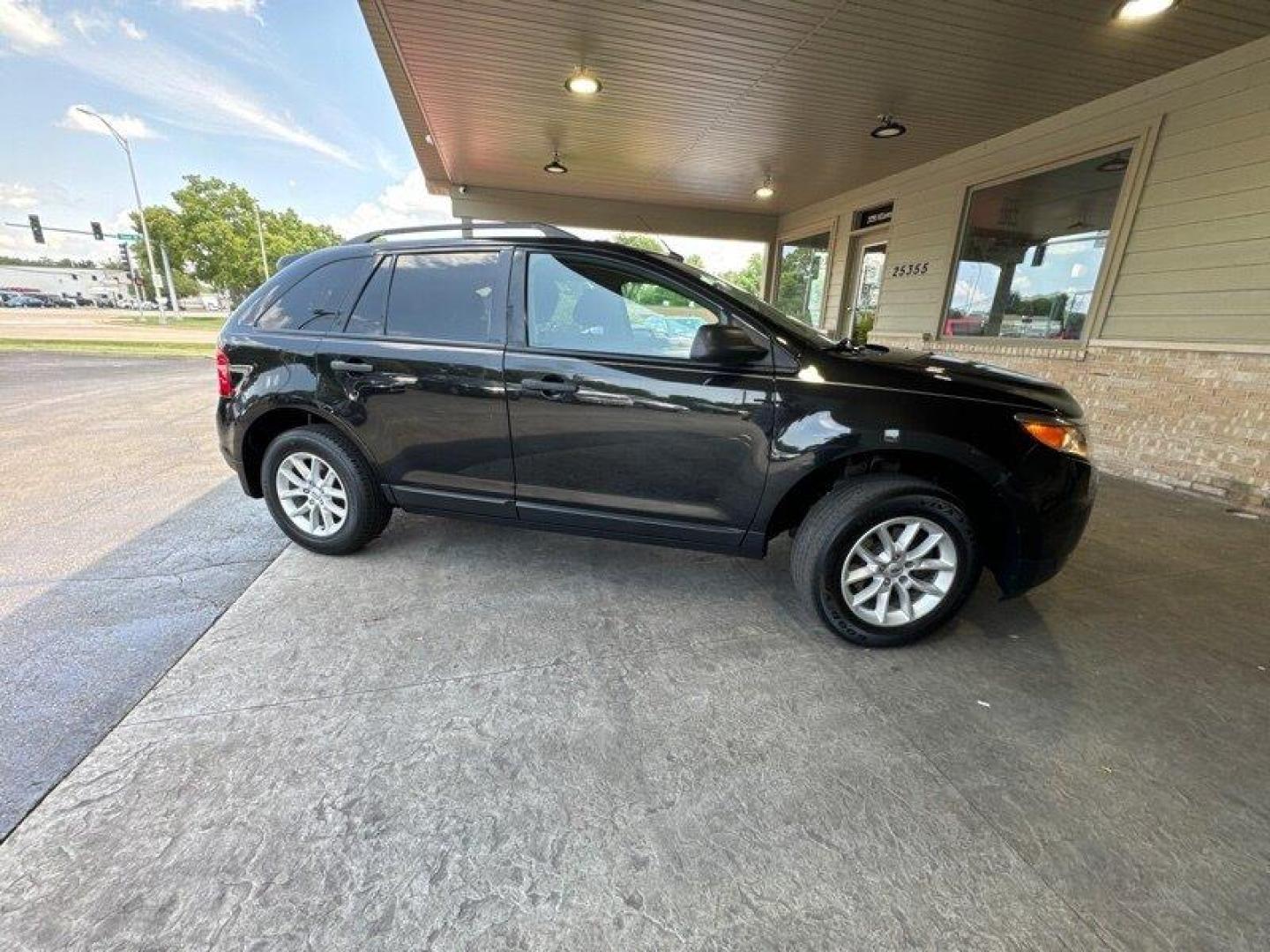 2013 Tuxedo Black Metallic Ford Edge SE (2FMDK3GC7DB) with an 3.5L V6 285hp 253ft. lbs. engine, Automatic transmission, located at 25355 Eames Street, Channahon, IL, 60410, (815) 467-1807, 41.429108, -88.228432 - Introducing the 2013 Ford Edge SE! This incredible SUV is powered by a 3.5L V6 engine, producing an impressive 285 horsepower and 253ft. lbs. of torque. With less than 97,000 miles on the odometer and averaging less than 9,000 miles per year, this vehicle is in fantastic condition and ready to take - Photo#2