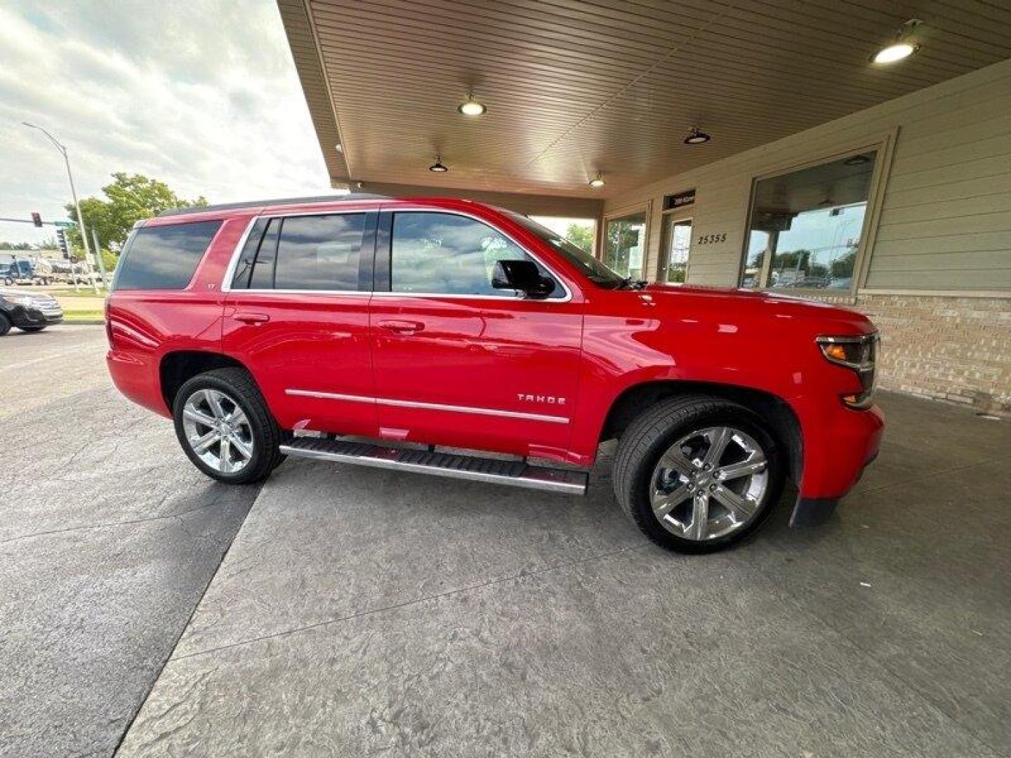 2017 Victory Red Chevrolet Tahoe LT (1GNSKBKC3HR) with an EcoTec3 5.3L Flex Fuel V8 355hp 383ft. lbs. engine, Automatic transmission, located at 25355 Eames Street, Channahon, IL, 60410, (815) 467-1807, 41.429108, -88.228432 - Hey there, car lovers! Feast your eyes on this bad boy - the 2017 Chevrolet Tahoe LT. This baby is powered by an EcoTec3 5.3L Flex Fuel V8 engine that churns out a whopping 355 horsepower and 383 feet-pound of torque. That's right, you heard it correctly - this SUV means business. But wait, there's - Photo#1