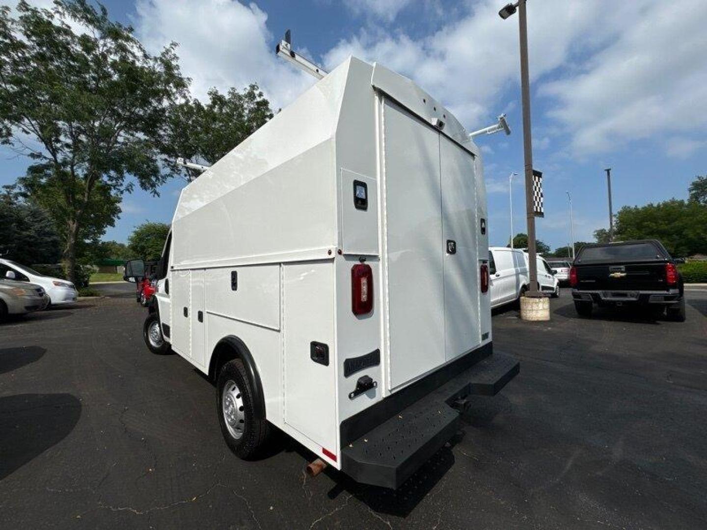 2021 White RAM ProMaster Low Roof 136 WB (3C7WRVKG4ME) with an Pentastar 3.6L V6 280hp 260ft. lbs. engine, Automatic transmission, located at 25355 Eames Street, Channahon, IL, 60410, (815) 467-1807, 41.429108, -88.228432 - KNAPHEIDE UTILITY BOX AND LADDER RACK. PASS THROUGH DOOR INTO CAB. OVERHEAD CAB SOTRAGE. BACK UP CAMERA. - Photo#5