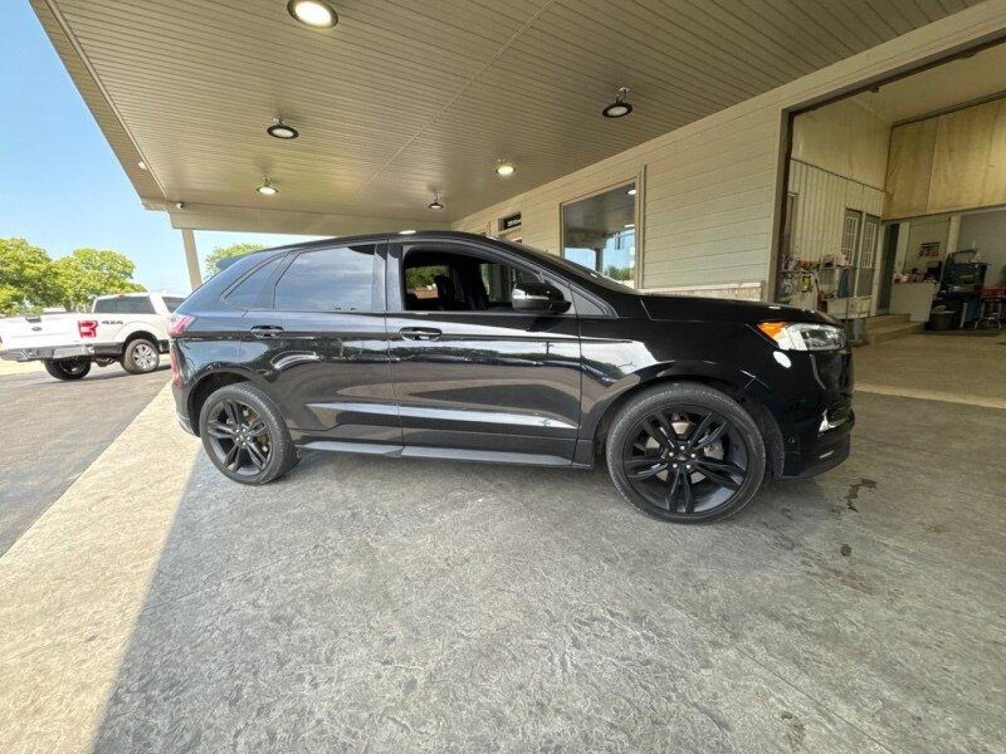 2019 Agate Black Ford Edge ST (2FMPK4AP2KB) with an EcoBoost 2.7L Twin Turbo V6 335hp 380ft. lbs. engine, Automatic transmission, located at 25355 Eames Street, Channahon, IL, 60410, (815) 467-1807, 41.429108, -88.228432 - Are you looking for a vehicle that packs a punch and turns heads on the road? Look no further than the 2019 Ford Edge ST. This powerful SUV is equipped with a cutting-edge EcoBoost 2.7L Twin Turbo V6 engine that delivers a whopping 335 horsepower and 380ft. lbs. of torque. But the power doesn't st - Photo#1