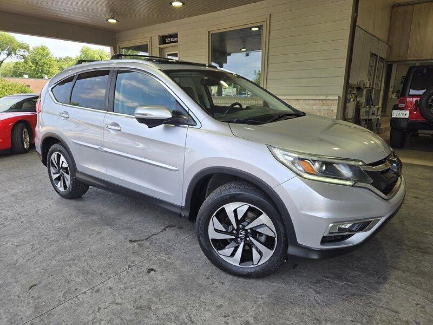 2015 Alabaster Silver Metallic Honda CR-V Touring (5J6RM3H98FL) with an 2.4L I4 185hp 181ft. lbs. engine, Automatic transmission, located at 25355 Eames Street, Channahon, IL, 60410, (815) 467-1807, 41.429108, -88.228432 - Oh honey, have we got a treat for you! Feast your eyes on the sleek and sexy 2015 Honda CR-V Touring in Alabaster Silver Metallic with a stunning Gray interior. This baby is powered by a fierce 2.4L I4 engine, giving you a whopping 185hp and 181ft. lbs. of torque. But wait, there's more! This bad - Photo#0