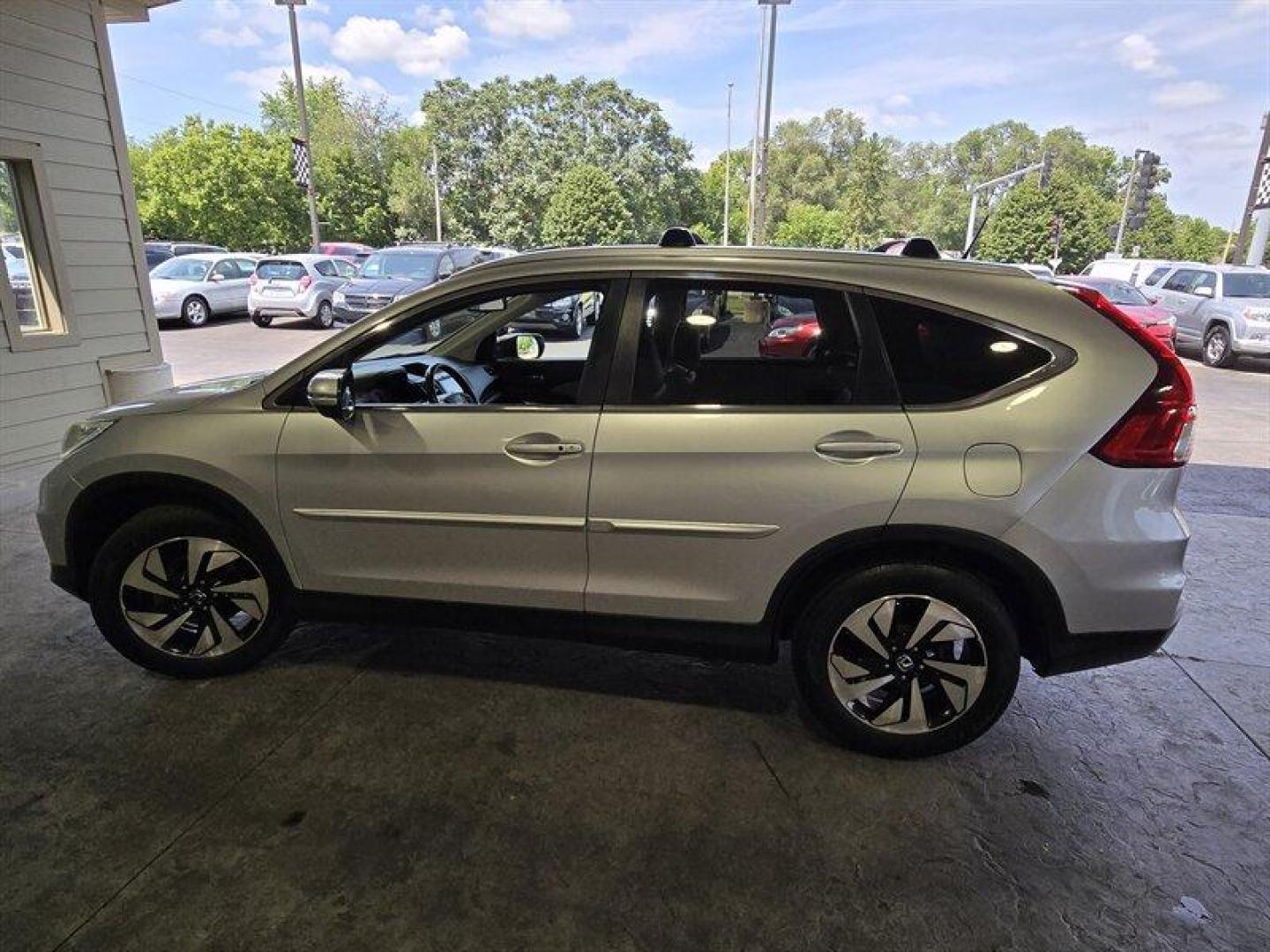 2015 Alabaster Silver Metallic Honda CR-V Touring (5J6RM3H98FL) with an 2.4L I4 185hp 181ft. lbs. engine, Automatic transmission, located at 25355 Eames Street, Channahon, IL, 60410, (815) 467-1807, 41.429108, -88.228432 - Oh honey, have we got a treat for you! Feast your eyes on the sleek and sexy 2015 Honda CR-V Touring in Alabaster Silver Metallic with a stunning Gray interior. This baby is powered by a fierce 2.4L I4 engine, giving you a whopping 185hp and 181ft. lbs. of torque. But wait, there's more! This bad - Photo#6