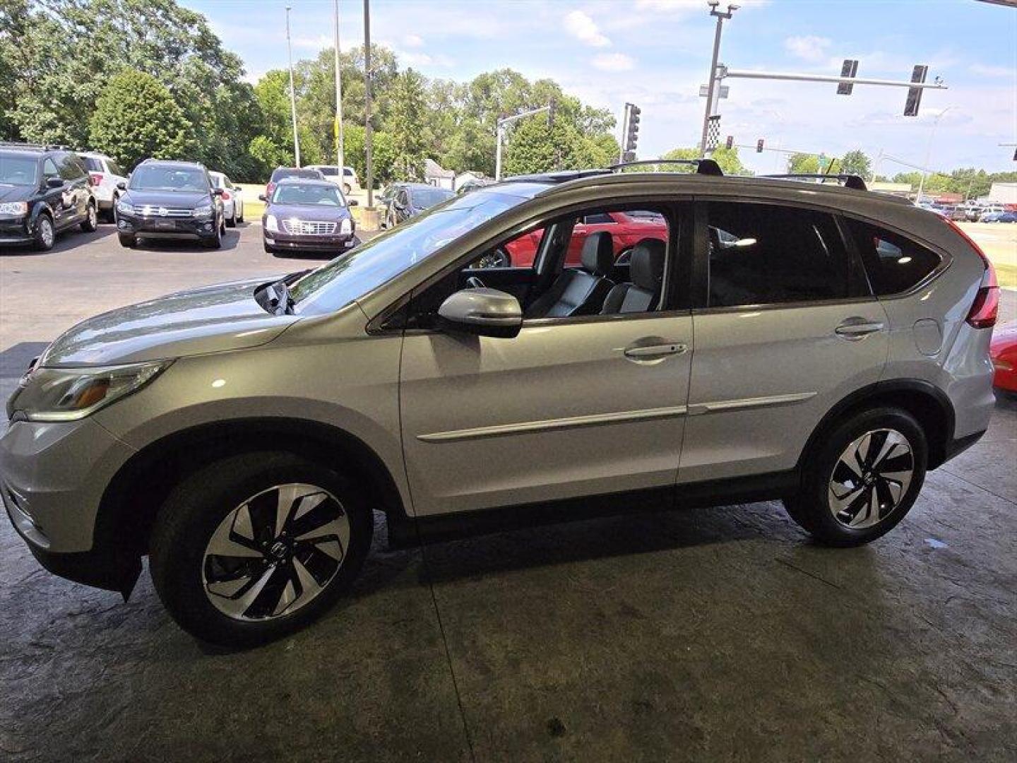 2015 Alabaster Silver Metallic Honda CR-V Touring (5J6RM3H98FL) with an 2.4L I4 185hp 181ft. lbs. engine, Automatic transmission, located at 25355 Eames Street, Channahon, IL, 60410, (815) 467-1807, 41.429108, -88.228432 - Oh honey, have we got a treat for you! Feast your eyes on the sleek and sexy 2015 Honda CR-V Touring in Alabaster Silver Metallic with a stunning Gray interior. This baby is powered by a fierce 2.4L I4 engine, giving you a whopping 185hp and 181ft. lbs. of torque. But wait, there's more! This bad - Photo#7