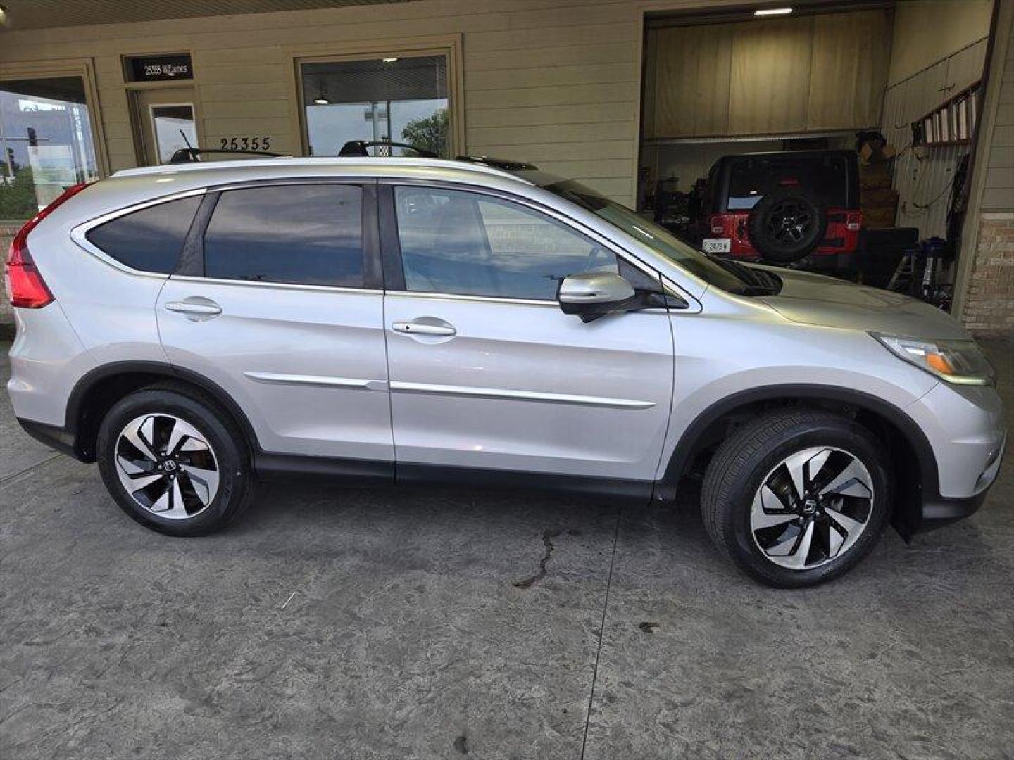 2015 Alabaster Silver Metallic Honda CR-V Touring (5J6RM3H98FL) with an 2.4L I4 185hp 181ft. lbs. engine, Automatic transmission, located at 25355 Eames Street, Channahon, IL, 60410, (815) 467-1807, 41.429108, -88.228432 - Oh honey, have we got a treat for you! Feast your eyes on the sleek and sexy 2015 Honda CR-V Touring in Alabaster Silver Metallic with a stunning Gray interior. This baby is powered by a fierce 2.4L I4 engine, giving you a whopping 185hp and 181ft. lbs. of torque. But wait, there's more! This bad - Photo#1