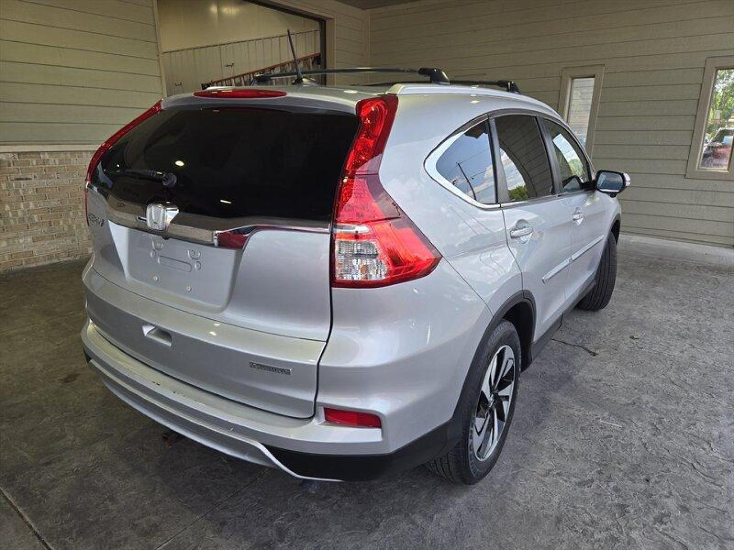 2015 Alabaster Silver Metallic Honda CR-V Touring (5J6RM3H98FL) with an 2.4L I4 185hp 181ft. lbs. engine, Automatic transmission, located at 25355 Eames Street, Channahon, IL, 60410, (815) 467-1807, 41.429108, -88.228432 - Oh honey, have we got a treat for you! Feast your eyes on the sleek and sexy 2015 Honda CR-V Touring in Alabaster Silver Metallic with a stunning Gray interior. This baby is powered by a fierce 2.4L I4 engine, giving you a whopping 185hp and 181ft. lbs. of torque. But wait, there's more! This bad - Photo#3