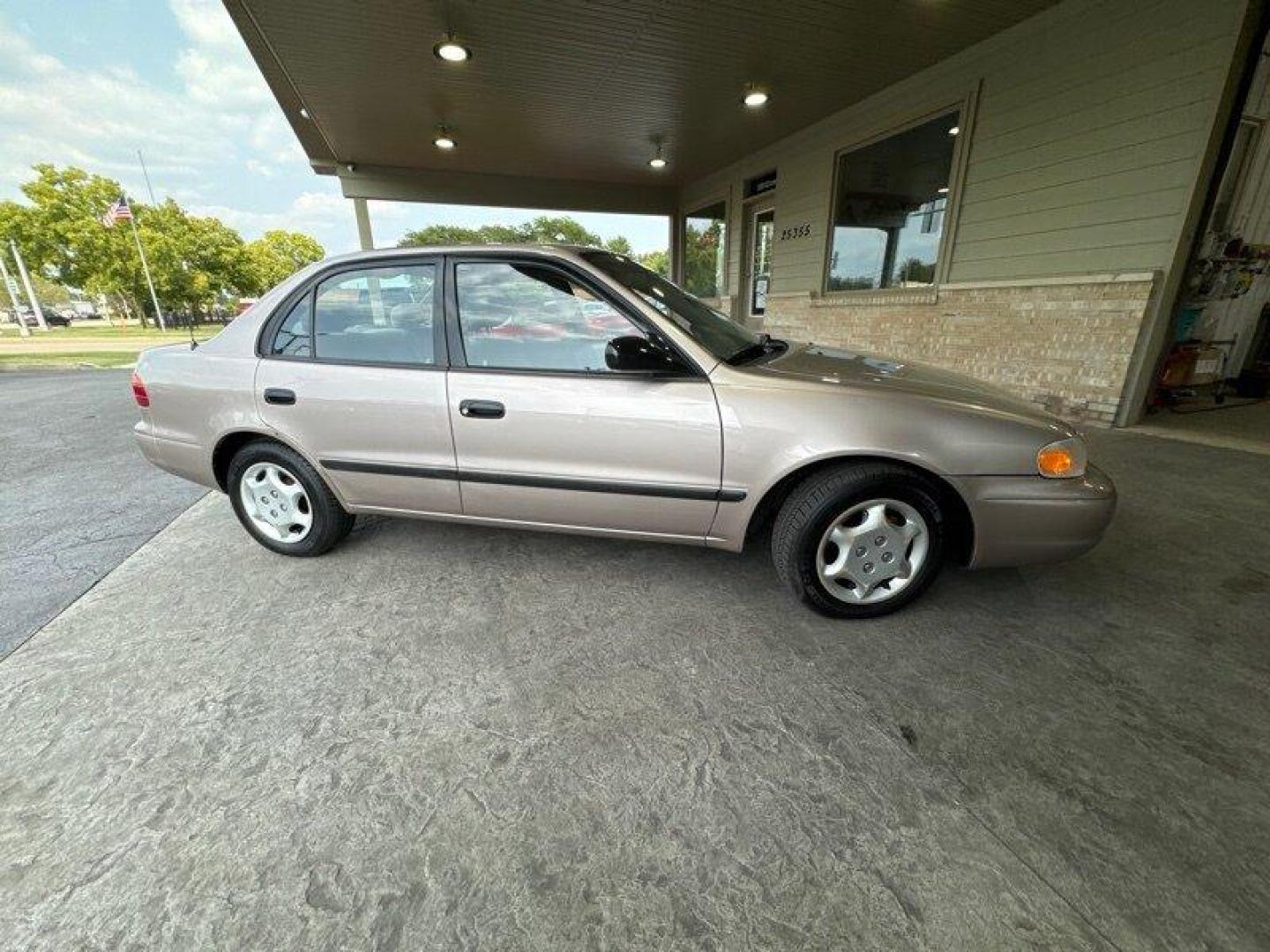 1998 Tan Chevrolet Prizm LSi (1Y1SK5288WZ) with an 1L NA I4 double overhead cam (DOHC) 16V engine, Automatic transmission, located at 25355 Eames Street, Channahon, IL, 60410, (815) 467-1807, 41.429108, -88.228432 - Looking for a car that can take you from point A to point B without breaking the bank? Look no further than the 1998 Chevrolet Prizm! This little guy is powered by a 1L NA I4 double overhead cam (DOHC) 16V engine that will get you where you need to go without burning a hole in your wallet. But that - Photo#2