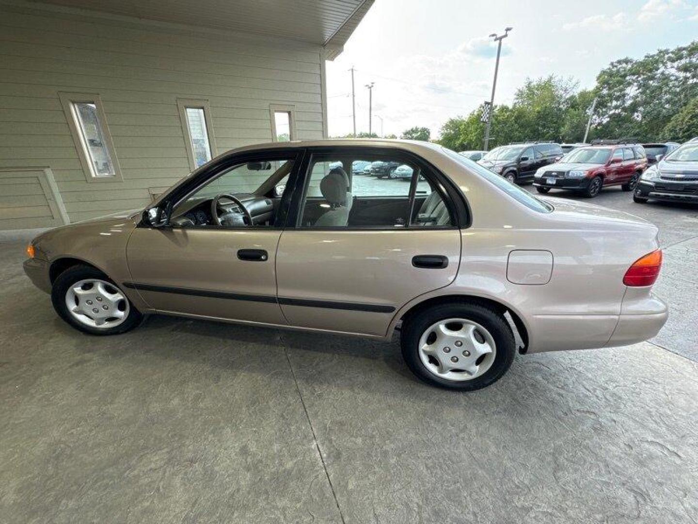 1998 Tan Chevrolet Prizm LSi (1Y1SK5288WZ) with an 1L NA I4 double overhead cam (DOHC) 16V engine, Automatic transmission, located at 25355 Eames Street, Channahon, IL, 60410, (815) 467-1807, 41.429108, -88.228432 - Looking for a car that can take you from point A to point B without breaking the bank? Look no further than the 1998 Chevrolet Prizm! This little guy is powered by a 1L NA I4 double overhead cam (DOHC) 16V engine that will get you where you need to go without burning a hole in your wallet. But that - Photo#6