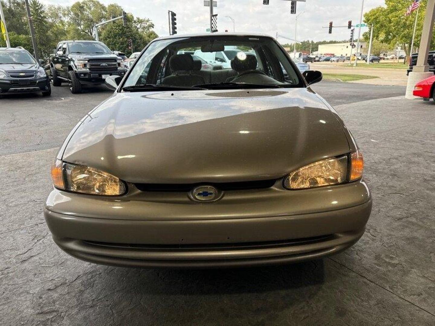 1998 Tan Chevrolet Prizm LSi (1Y1SK5288WZ) with an 1L NA I4 double overhead cam (DOHC) 16V engine, Automatic transmission, located at 25355 Eames Street, Channahon, IL, 60410, (815) 467-1807, 41.429108, -88.228432 - Looking for a car that can take you from point A to point B without breaking the bank? Look no further than the 1998 Chevrolet Prizm! This little guy is powered by a 1L NA I4 double overhead cam (DOHC) 16V engine that will get you where you need to go without burning a hole in your wallet. But that - Photo#8