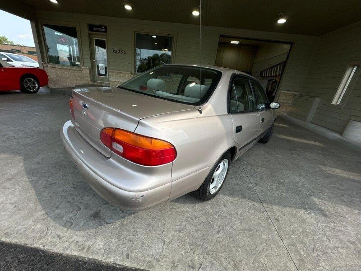 1998 Tan Chevrolet Prizm LSi (1Y1SK5288WZ) with an 1L NA I4 double overhead cam (DOHC) 16V engine, Automatic transmission, located at 25355 Eames Street, Channahon, IL, 60410, (815) 467-1807, 41.429108, -88.228432 - Photo#3