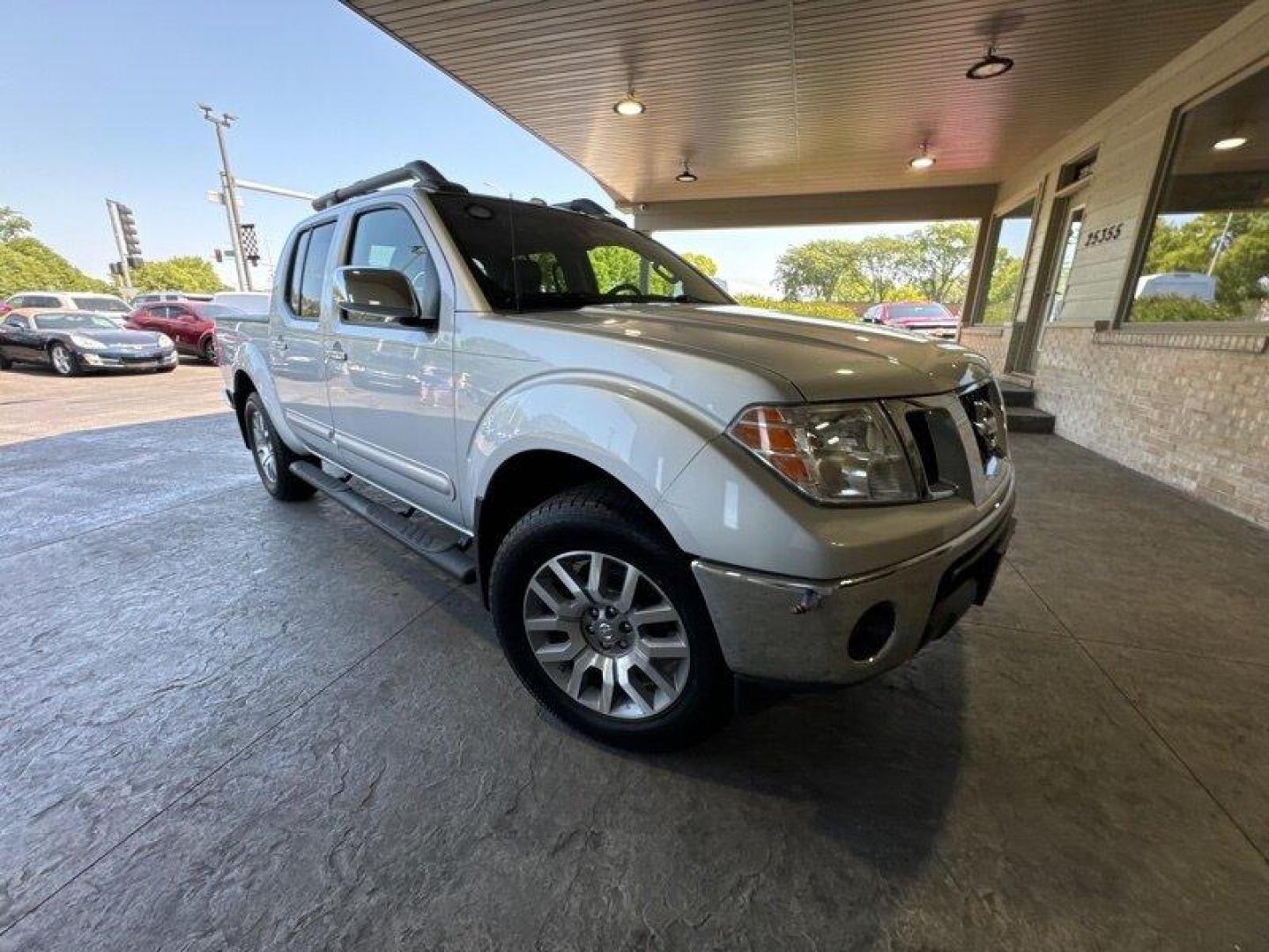 2012 Brilliant Silver Nissan Frontier SL (1N6AD0EV2CC) with an 4.0L V6 261hp 281ft. lbs. engine, Automatic transmission, located at 25355 Eames Street, Channahon, IL, 60410, (815) 467-1807, 41.429108, -88.228432 - Introducing the 2012 Nissan Frontier SL, a powerful and reliable pickup truck that's perfect for both work and play. This beauty is powered by a 4.0L V6 engine that delivers a whopping 261hp and 281ft. lbs. of torque, giving you all the power you need to tackle any job. One of the best things about - Photo#0