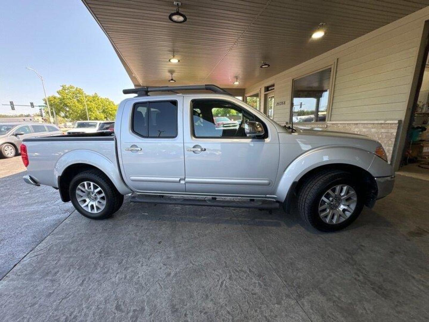 2012 Brilliant Silver Nissan Frontier SL (1N6AD0EV2CC) with an 4.0L V6 261hp 281ft. lbs. engine, Automatic transmission, located at 25355 Eames Street, Channahon, IL, 60410, (815) 467-1807, 41.429108, -88.228432 - Introducing the 2012 Nissan Frontier SL, a powerful and reliable pickup truck that's perfect for both work and play. This beauty is powered by a 4.0L V6 engine that delivers a whopping 261hp and 281ft. lbs. of torque, giving you all the power you need to tackle any job. One of the best things about - Photo#2