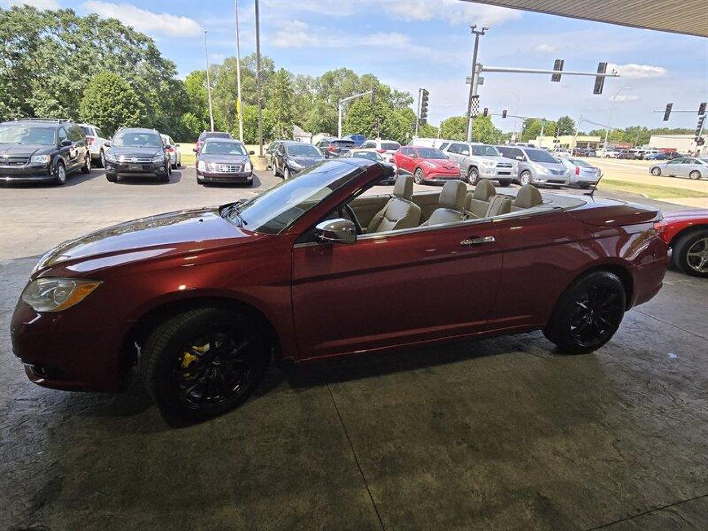 2011 Deep Cherry Red Crystal Pearl Coat Chrysler 200 Limited (1C3BC7EG0BN) with an Pentastar 3.6L Flex Fuel V6 283hp 260ft. lbs. engine, Automatic transmission, located at 25355 Eames Street, Channahon, IL, 60410, (815) 467-1807, 41.429108, -88.228432 - Ladies and gentlemen, feast your eyes on the 2011 Chrysler 200 Limited! This beauty is powered by a Pentastar 3.6L Flex Fuel V6 engine that packs a punch with 283 horsepower and 260 ft. lbs. of torque. You'll feel like a race car driver cruising down the highway in this bad boy. But wait, there's m - Photo#7