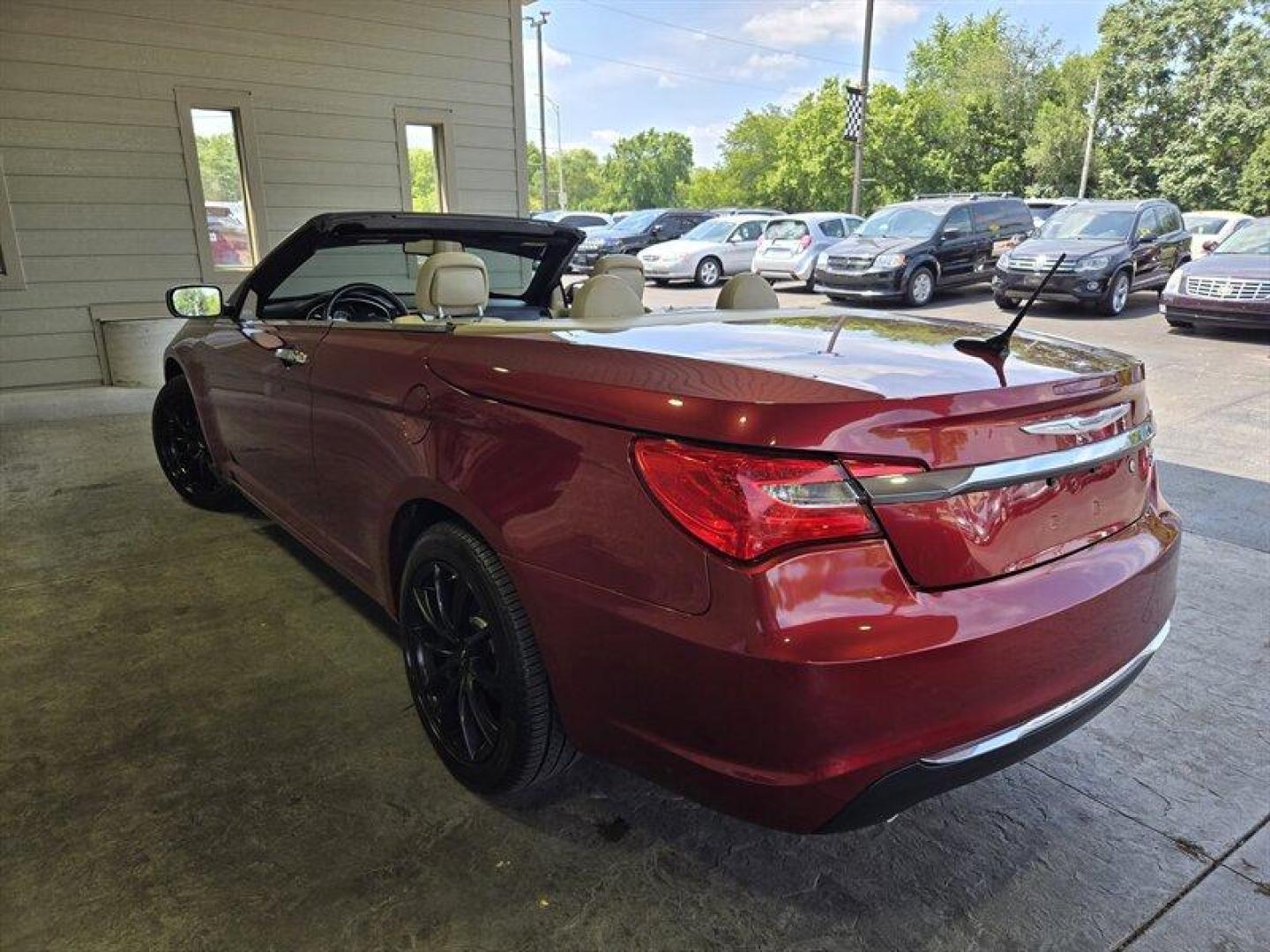 2011 Deep Cherry Red Crystal Pearl Coat Chrysler 200 Limited (1C3BC7EG0BN) with an Pentastar 3.6L Flex Fuel V6 283hp 260ft. lbs. engine, Automatic transmission, located at 25355 Eames Street, Channahon, IL, 60410, (815) 467-1807, 41.429108, -88.228432 - Ladies and gentlemen, feast your eyes on the 2011 Chrysler 200 Limited! This beauty is powered by a Pentastar 3.6L Flex Fuel V6 engine that packs a punch with 283 horsepower and 260 ft. lbs. of torque. You'll feel like a race car driver cruising down the highway in this bad boy. But wait, there's m - Photo#5