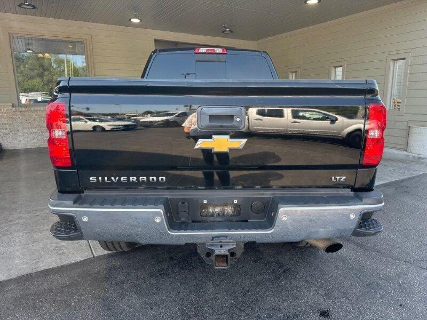 2015 Black Chevrolet Silverado 2500 LTZ (1GC1KWEG5FF) with an Vortec 6.0L Flex Fuel V8 360hp 380ft. lbs. engine, Automatic transmission, located at 25355 Eames Street, Channahon, IL, 60410, (815) 467-1807, 41.429108, -88.228432 - Oh, honey, let me tell you about the 2015 Chevrolet Silverado 2500 LTZ. This bad boy is powered by a Vortec 6.0L Flex Fuel V8 engine that's packing 360 horsepower and 380 foot-pounds of torque. You'll be able to tow just about anything with that kind of power under the hood. But it's not just the e - Photo#4