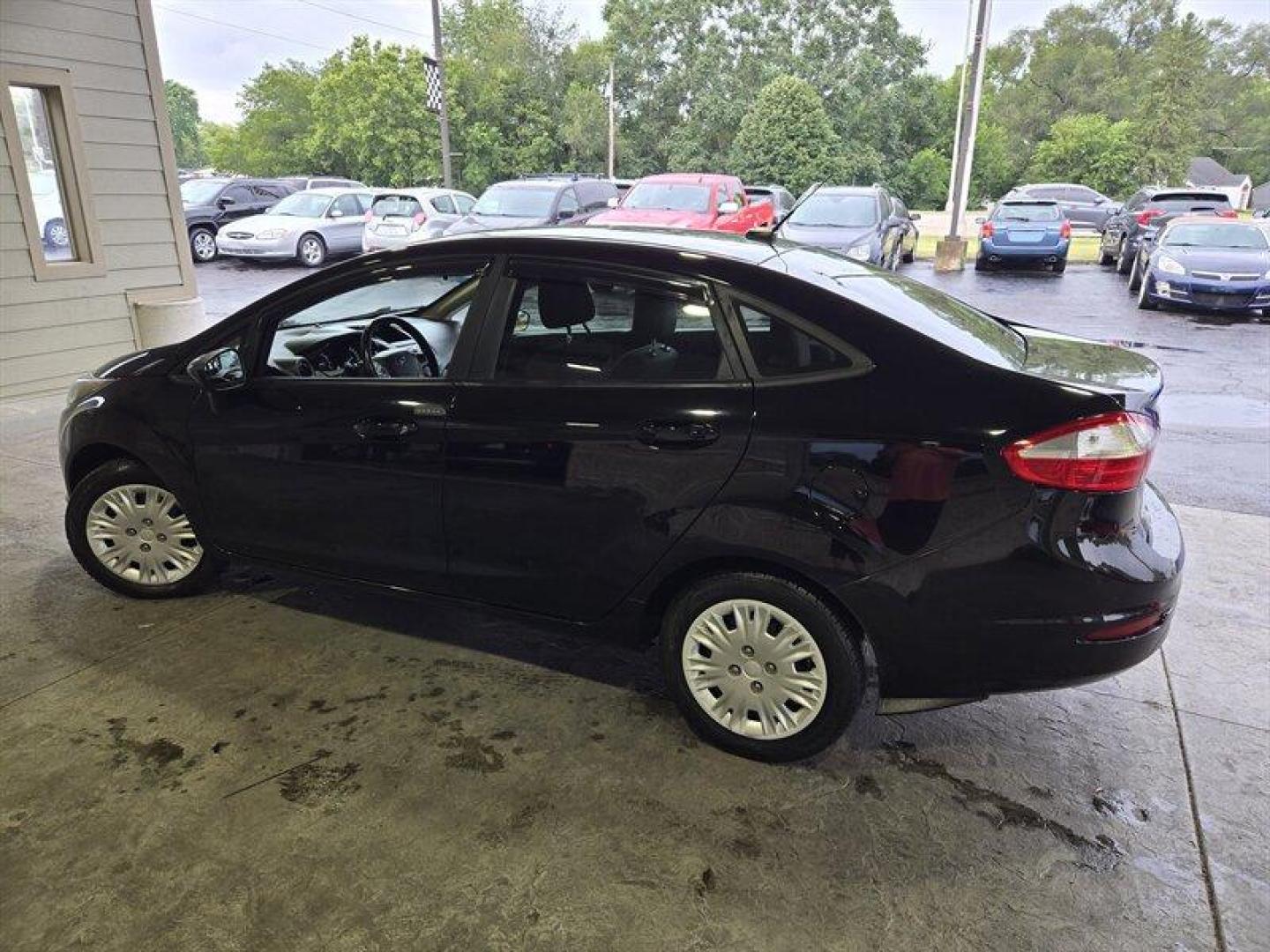 2018 Shadow Black Ford Fiesta S (3FADP4AJ2JM) with an 1.6L I4 120hp 112ft. lbs. engine, 5 Speed Manual transmission, located at 25355 Eames Street, Channahon, IL, 60410, (815) 467-1807, 41.429108, -88.228432 - Looking for a fun and stylish ride that won't break the bank? Look no further than the 2018 Ford Fiesta S! This compact car packs a punch with its 1.6L I4 engine, producing 120 horsepower and 112 foot-pounds of torque. And with its impressive fuel efficiency of 27 MPG in the city and 35 MPG on the h - Photo#8