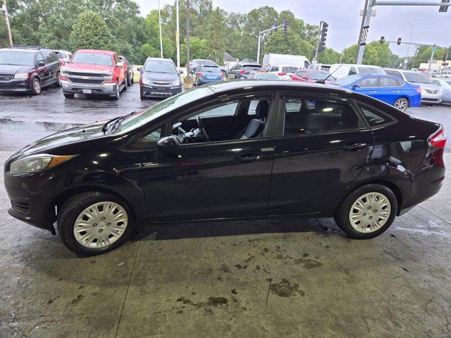 2018 Shadow Black Ford Fiesta S (3FADP4AJ2JM) with an 1.6L I4 120hp 112ft. lbs. engine, 5 Speed Manual transmission, located at 25355 Eames Street, Channahon, IL, 60410, (815) 467-1807, 41.429108, -88.228432 - Looking for a fun and stylish ride that won't break the bank? Look no further than the 2018 Ford Fiesta S! This compact car packs a punch with its 1.6L I4 engine, producing 120 horsepower and 112 foot-pounds of torque. And with its impressive fuel efficiency of 27 MPG in the city and 35 MPG on the h - Photo#9