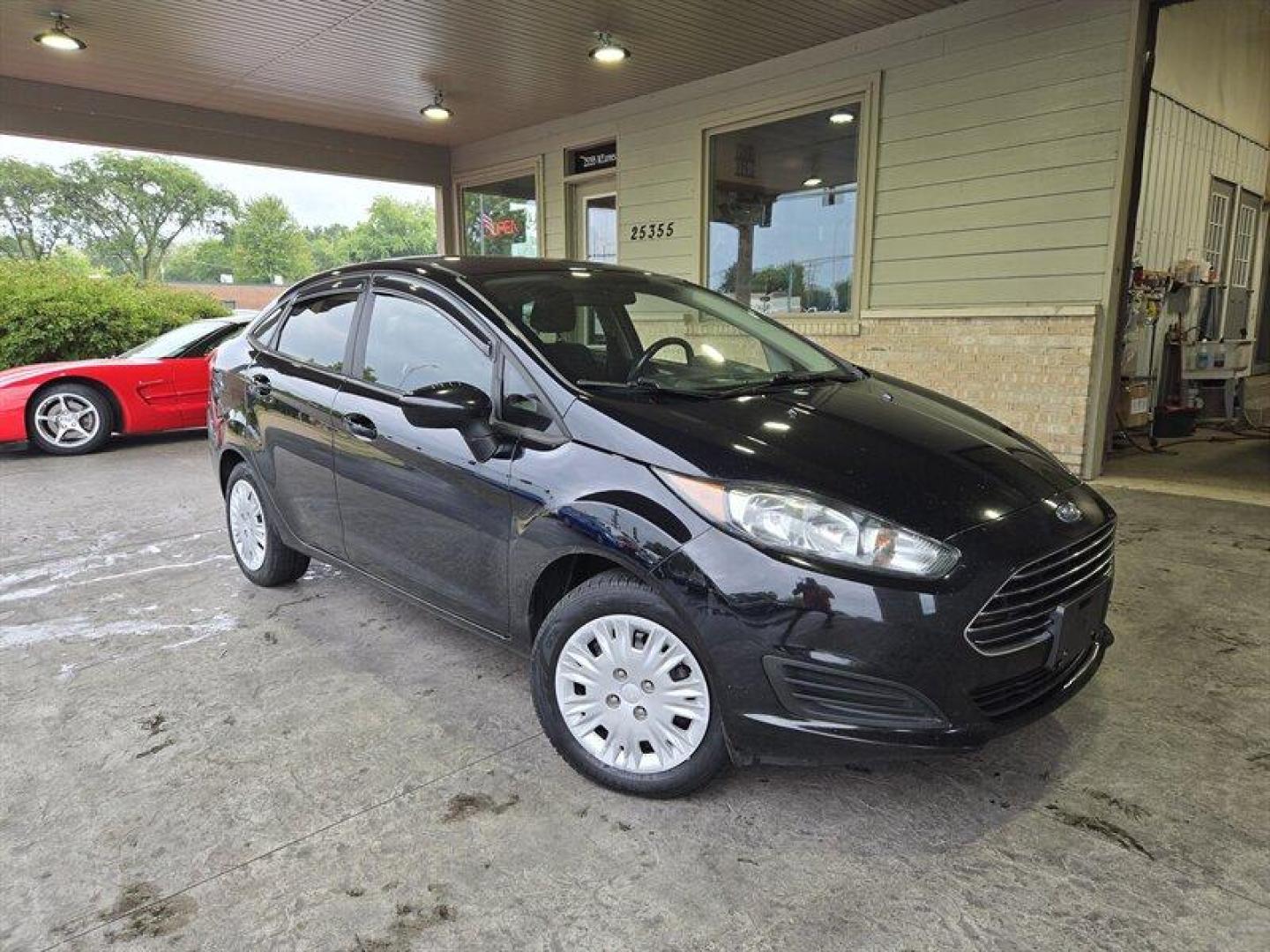 2018 Shadow Black Ford Fiesta S (3FADP4AJ2JM) with an 1.6L I4 120hp 112ft. lbs. engine, 5 Speed Manual transmission, located at 25355 Eames Street, Channahon, IL, 60410, (815) 467-1807, 41.429108, -88.228432 - Looking for a fun and stylish ride that won't break the bank? Look no further than the 2018 Ford Fiesta S! This compact car packs a punch with its 1.6L I4 engine, producing 120 horsepower and 112 foot-pounds of torque. And with its impressive fuel efficiency of 27 MPG in the city and 35 MPG on the h - Photo#0