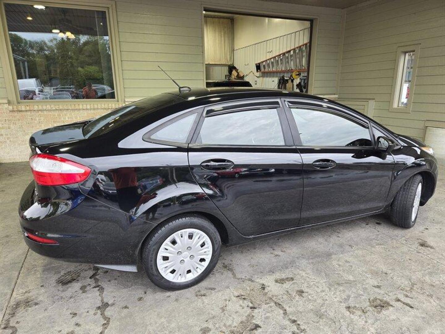 2018 Shadow Black Ford Fiesta S (3FADP4AJ2JM) with an 1.6L I4 120hp 112ft. lbs. engine, 5 Speed Manual transmission, located at 25355 Eames Street, Channahon, IL, 60410, (815) 467-1807, 41.429108, -88.228432 - Looking for a fun and stylish ride that won't break the bank? Look no further than the 2018 Ford Fiesta S! This compact car packs a punch with its 1.6L I4 engine, producing 120 horsepower and 112 foot-pounds of torque. And with its impressive fuel efficiency of 27 MPG in the city and 35 MPG on the h - Photo#4