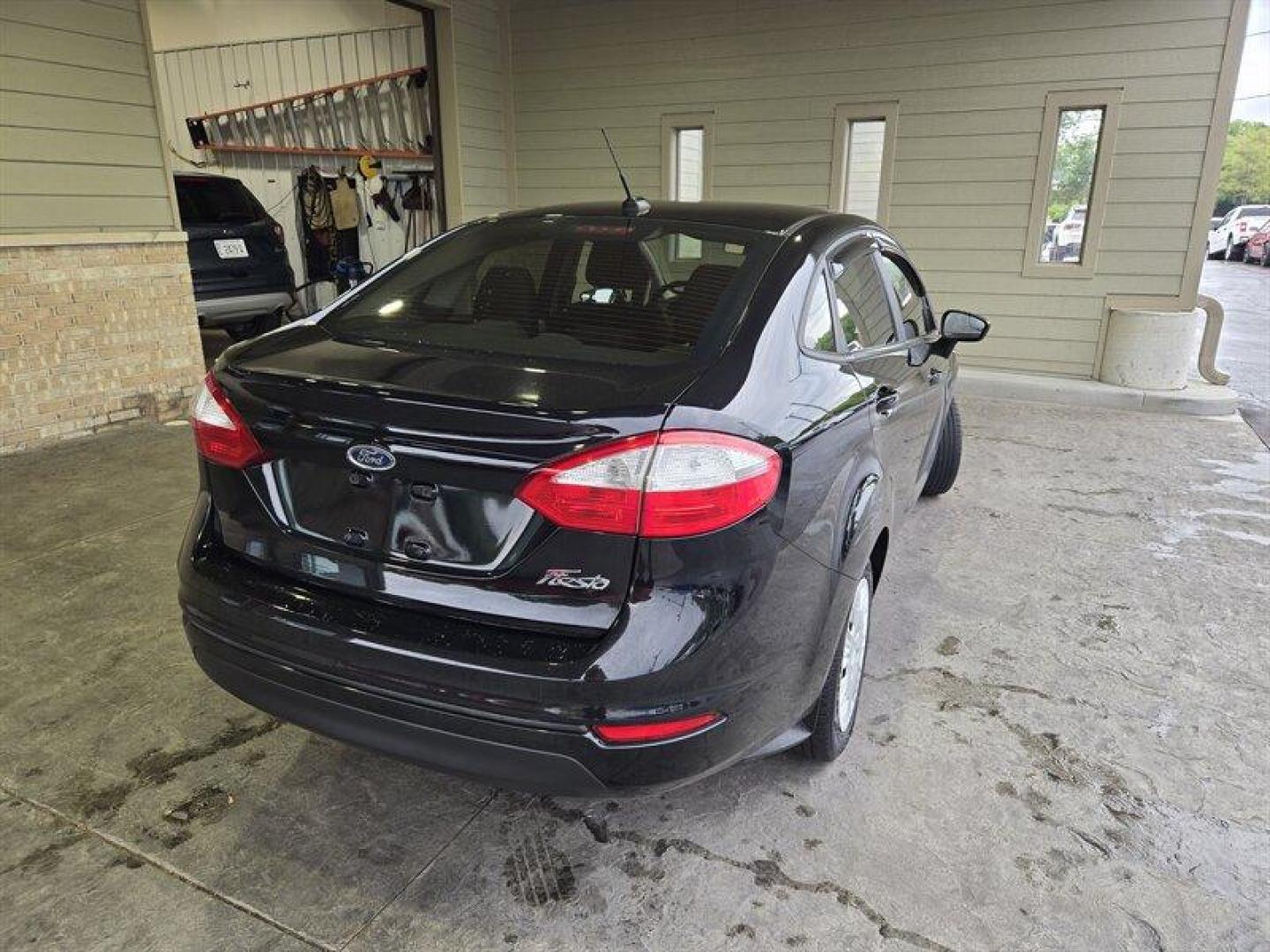 2018 Shadow Black Ford Fiesta S (3FADP4AJ2JM) with an 1.6L I4 120hp 112ft. lbs. engine, 5 Speed Manual transmission, located at 25355 Eames Street, Channahon, IL, 60410, (815) 467-1807, 41.429108, -88.228432 - Looking for a fun and stylish ride that won't break the bank? Look no further than the 2018 Ford Fiesta S! This compact car packs a punch with its 1.6L I4 engine, producing 120 horsepower and 112 foot-pounds of torque. And with its impressive fuel efficiency of 27 MPG in the city and 35 MPG on the h - Photo#5