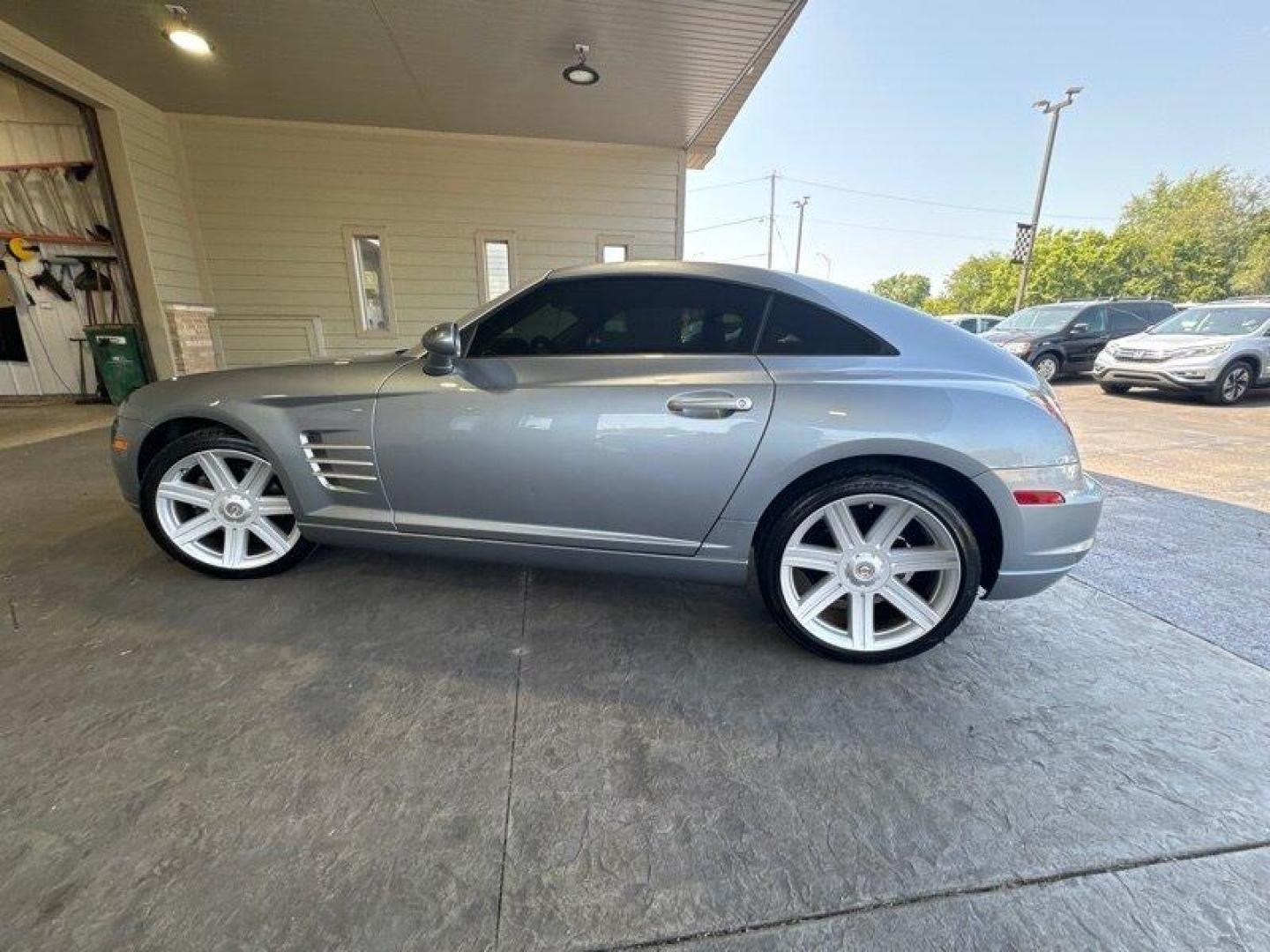 2005 Aero Blue Pearlcoat Chrysler Crossfire Limited (1C3AN69L85X) with an 3.2L V6 215hp 229ft. lbs. engine, 3 Speed Manual transmission, located at 25355 Eames Street, Channahon, IL, 60410, (815) 467-1807, 41.429108, -88.228432 - Get ready to turn heads with the sleek and stylish 2005 Chrysler Crossfire Limited! This baby is powered by a 3.2L V6 engine with 215 horsepower and 229ft. lbs. of torque, making it an absolute joy to drive. And with less than 31,000 miles on the odometer, you're practically getting a brand new car! - Photo#6