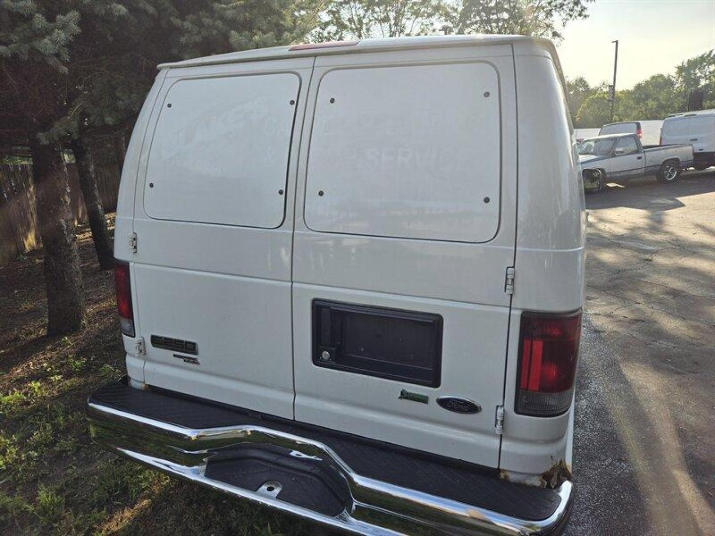 2011 Oxford White Ford E-250 (1FTNS2EW1BD) with an Triton 4.6L Flex Fuel V8 225hp 286ft. lbs. engine, Automatic transmission, located at 25355 Eames Street, Channahon, IL, 60410, (815) 467-1807, 41.429108, -88.228432 - Photo#2