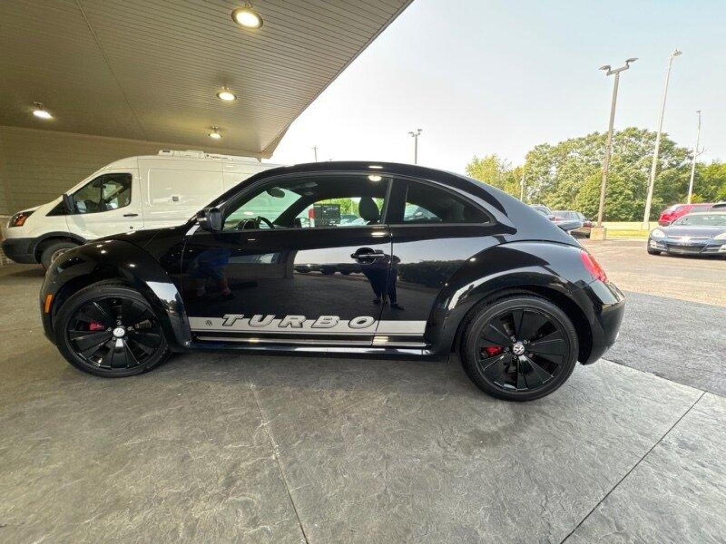 2012 Deep Black Pearl Metallic Volkswagen Beetle-Classic 2.0 TSi (3VW4A7AT0CM) with an 2.0L Turbo I4 200hp 207ft. lbs. PZEV engine, 6 Speed Manual transmission, located at 25355 Eames Street, Channahon, IL, 60410, (815) 467-1807, 41.429108, -88.228432 - Introducing the 2012 Volkswagen Beetle-Classic Turbo PZEV! This vehicle is powered by a 2.0L Turbo I4 engine, producing 200 horsepower and 207 ft. lbs. of torque, while also being PZEV-certified. With less than 98,000 miles on the odometer, this vehicle has been well-maintained, averaging less than - Photo#6