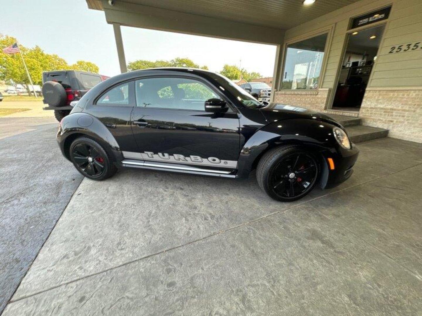 2012 Deep Black Pearl Metallic Volkswagen Beetle-Classic 2.0 TSi (3VW4A7AT0CM) with an 2.0L Turbo I4 200hp 207ft. lbs. PZEV engine, 6 Speed Manual transmission, located at 25355 Eames Street, Channahon, IL, 60410, (815) 467-1807, 41.429108, -88.228432 - Introducing the 2012 Volkswagen Beetle-Classic Turbo PZEV! This vehicle is powered by a 2.0L Turbo I4 engine, producing 200 horsepower and 207 ft. lbs. of torque, while also being PZEV-certified. With less than 98,000 miles on the odometer, this vehicle has been well-maintained, averaging less than - Photo#1