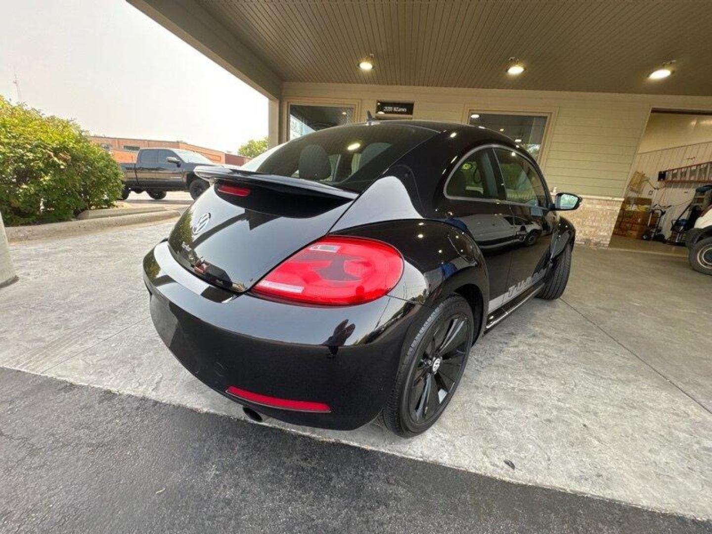 2012 Deep Black Pearl Metallic Volkswagen Beetle-Classic 2.0 TSi (3VW4A7AT0CM) with an 2.0L Turbo I4 200hp 207ft. lbs. PZEV engine, 6 Speed Manual transmission, located at 25355 Eames Street, Channahon, IL, 60410, (815) 467-1807, 41.429108, -88.228432 - Introducing the 2012 Volkswagen Beetle-Classic Turbo PZEV! This vehicle is powered by a 2.0L Turbo I4 engine, producing 200 horsepower and 207 ft. lbs. of torque, while also being PZEV-certified. With less than 98,000 miles on the odometer, this vehicle has been well-maintained, averaging less than - Photo#3