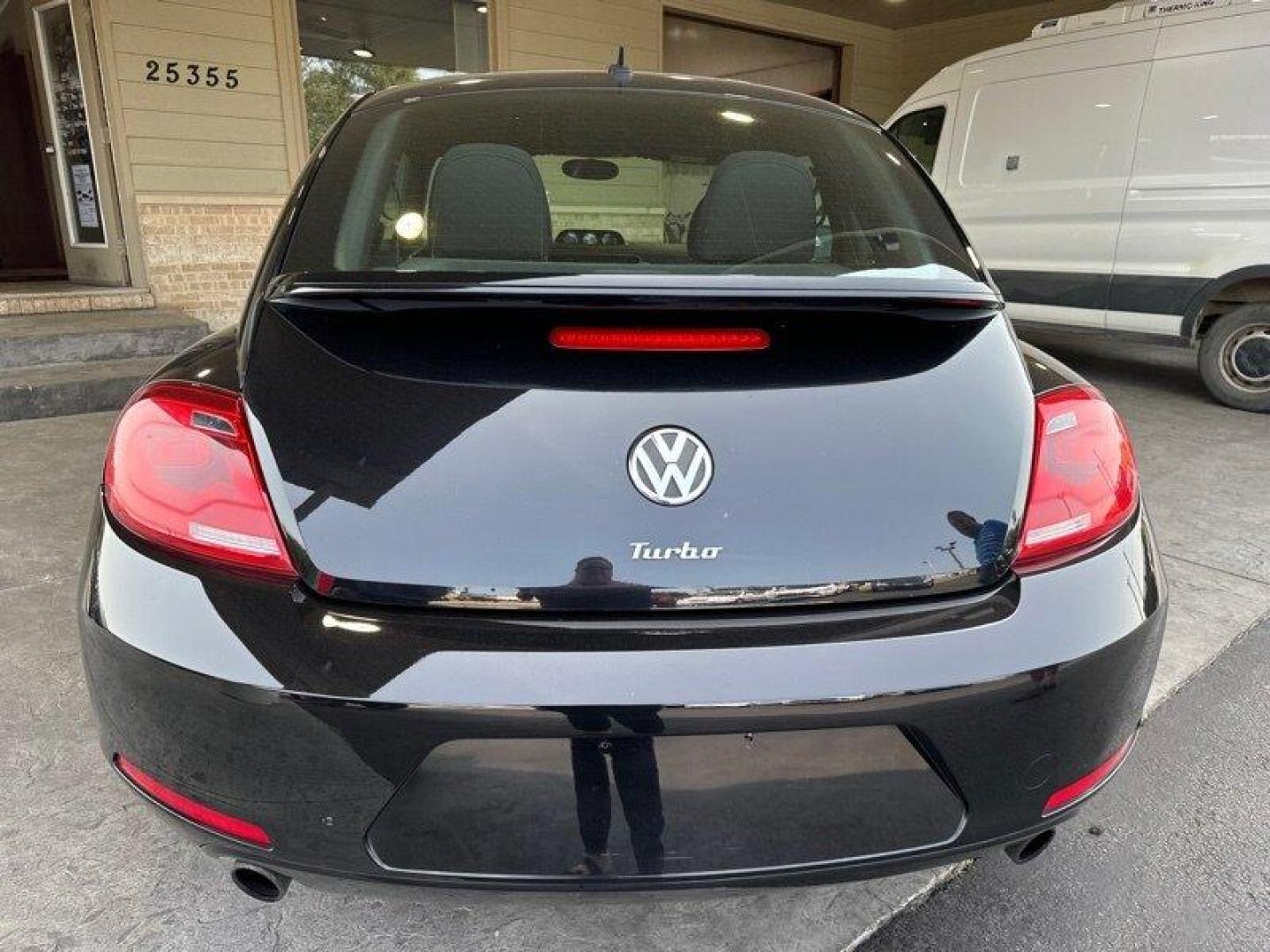 2012 Deep Black Pearl Metallic Volkswagen Beetle-Classic 2.0 TSi (3VW4A7AT0CM) with an 2.0L Turbo I4 200hp 207ft. lbs. PZEV engine, 6 Speed Manual transmission, located at 25355 Eames Street, Channahon, IL, 60410, (815) 467-1807, 41.429108, -88.228432 - Introducing the 2012 Volkswagen Beetle-Classic Turbo PZEV! This vehicle is powered by a 2.0L Turbo I4 engine, producing 200 horsepower and 207 ft. lbs. of torque, while also being PZEV-certified. With less than 98,000 miles on the odometer, this vehicle has been well-maintained, averaging less than - Photo#4