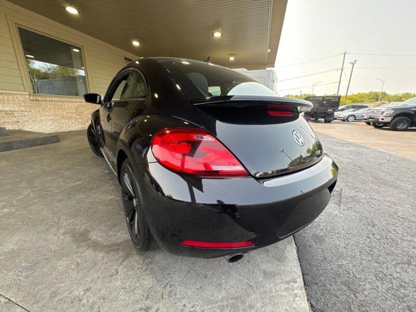 2012 Deep Black Pearl Metallic Volkswagen Beetle-Classic 2.0 TSi (3VW4A7AT0CM) with an 2.0L Turbo I4 200hp 207ft. lbs. PZEV engine, 6 Speed Manual transmission, located at 25355 Eames Street, Channahon, IL, 60410, (815) 467-1807, 41.429108, -88.228432 - Introducing the 2012 Volkswagen Beetle-Classic Turbo PZEV! This vehicle is powered by a 2.0L Turbo I4 engine, producing 200 horsepower and 207 ft. lbs. of torque, while also being PZEV-certified. With less than 98,000 miles on the odometer, this vehicle has been well-maintained, averaging less than - Photo#5