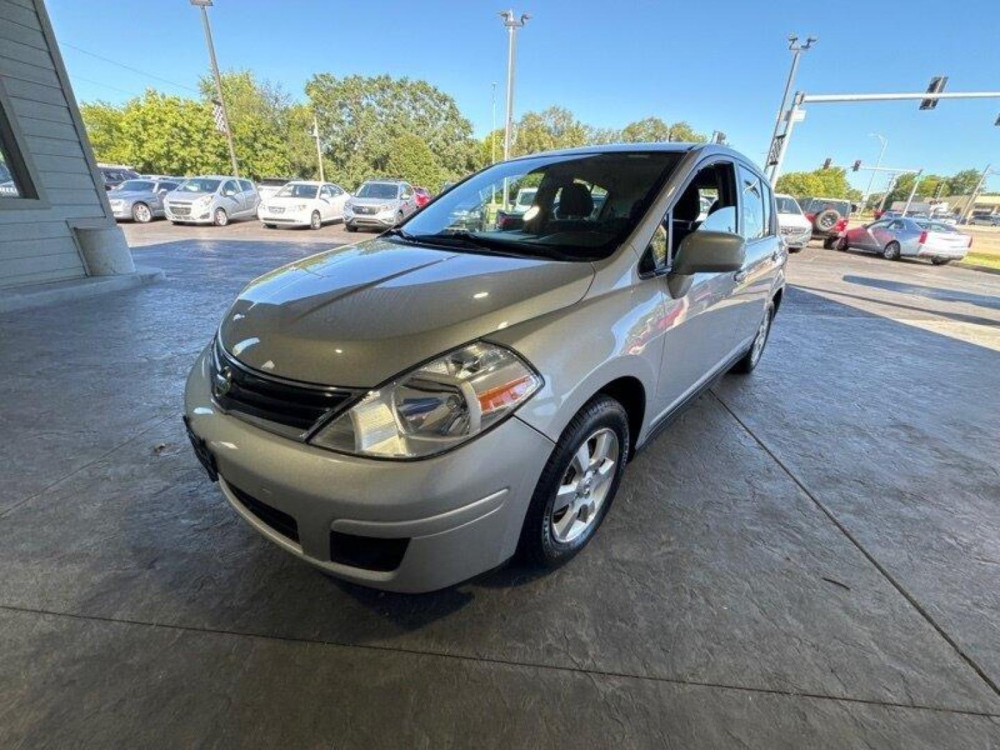 2012 Brilliant Silver Nissan Versa 1.8 S (3N1BC1CP2CK) with an 1.8L I4 122hp 127ft. lbs. engine, Automatic transmission, located at 25355 Eames Street, Channahon, IL, 60410, (815) 467-1807, 41.429108, -88.228432 - Looking for a car that's efficient, reliable, and doesn't break the bank? Look no further than the 2012 Nissan Versa 1.8 S! This baby is powered by a 1.8L I4 122hp 127ft. lbs. engine, which means it's got some pep in its step but won't guzzle gas like a frat boy at a kegger. Speaking of gas, you'll - Photo#8