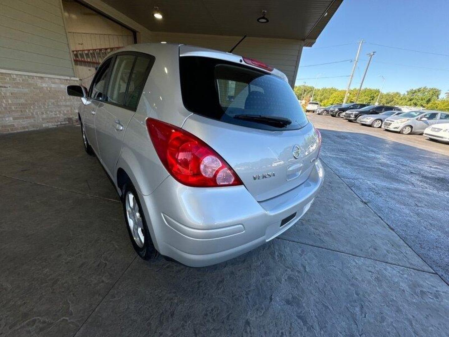 2012 Brilliant Silver Nissan Versa 1.8 S (3N1BC1CP2CK) with an 1.8L I4 122hp 127ft. lbs. engine, Automatic transmission, located at 25355 Eames Street, Channahon, IL, 60410, (815) 467-1807, 41.429108, -88.228432 - Looking for a car that's efficient, reliable, and doesn't break the bank? Look no further than the 2012 Nissan Versa 1.8 S! This baby is powered by a 1.8L I4 122hp 127ft. lbs. engine, which means it's got some pep in its step but won't guzzle gas like a frat boy at a kegger. Speaking of gas, you'll - Photo#6