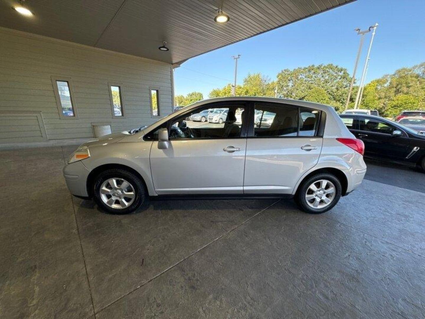 2012 Brilliant Silver Nissan Versa 1.8 S (3N1BC1CP2CK) with an 1.8L I4 122hp 127ft. lbs. engine, Automatic transmission, located at 25355 Eames Street, Channahon, IL, 60410, (815) 467-1807, 41.429108, -88.228432 - Looking for a car that's efficient, reliable, and doesn't break the bank? Look no further than the 2012 Nissan Versa 1.8 S! This baby is powered by a 1.8L I4 122hp 127ft. lbs. engine, which means it's got some pep in its step but won't guzzle gas like a frat boy at a kegger. Speaking of gas, you'll - Photo#7