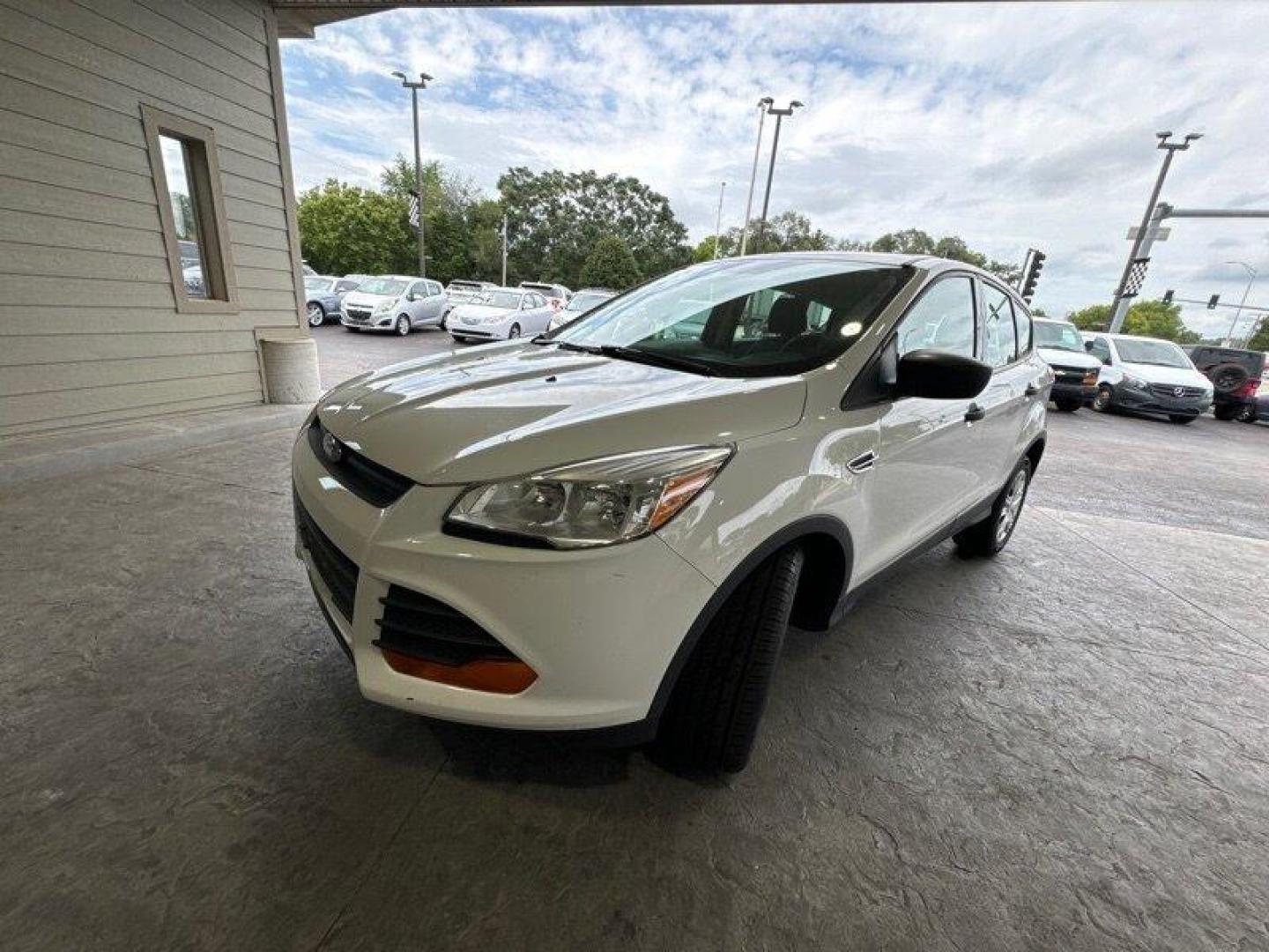 2015 Oxford White Ford Escape S (1FMCU0F76FU) with an Duratec 2.5L I4 168hp 170ft. lbs. engine, Automatic transmission, located at 25355 Eames Street, Channahon, IL, 60410, (815) 467-1807, 41.429108, -88.228432 - Introducing the 2015 Ford Escape S, a compact SUV that's more than just a pretty face. This baby is powered by a Duratec 2.5L I4 engine that packs a punch with 168hp and 170ft. lbs. of torque. You know what that means? You'll be zipping around town like a superhero on a mission to save the day. But - Photo#7