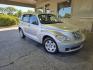 2009 Bright Silver Metallic Clear Coat Chrysler PT Cruiser LX (3A8FY48969T) with an 2.4L I4 150hp 165ft. lbs. engine, Automatic transmission, located at 25355 Eames Street, Channahon, IL, 60410, (815) 467-1807, 41.429108, -88.228432 - Looking for a ride that's both stylish and practical? Look no further than this 2009 Chrysler PT Cruiser. Powered by a 2.4L I4 engine that packs a punch with 150 horsepower and 165ft. lbs. of torque, this baby is built to impress. But that's not all. This PT Cruiser comes with a whole host of facto - Photo#0