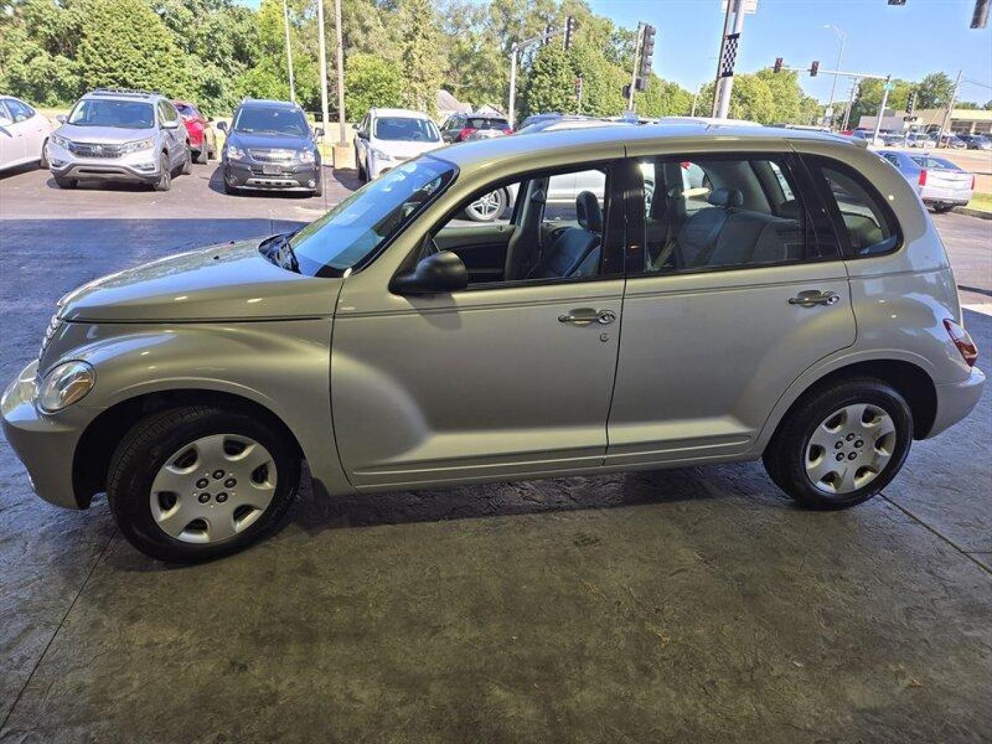 2009 Bright Silver Metallic Clear Coat Chrysler PT Cruiser LX (3A8FY48969T) with an 2.4L I4 150hp 165ft. lbs. engine, Automatic transmission, located at 25355 Eames Street, Channahon, IL, 60410, (815) 467-1807, 41.429108, -88.228432 - Looking for a ride that's both stylish and practical? Look no further than this 2009 Chrysler PT Cruiser. Powered by a 2.4L I4 engine that packs a punch with 150 horsepower and 165ft. lbs. of torque, this baby is built to impress. But that's not all. This PT Cruiser comes with a whole host of facto - Photo#5