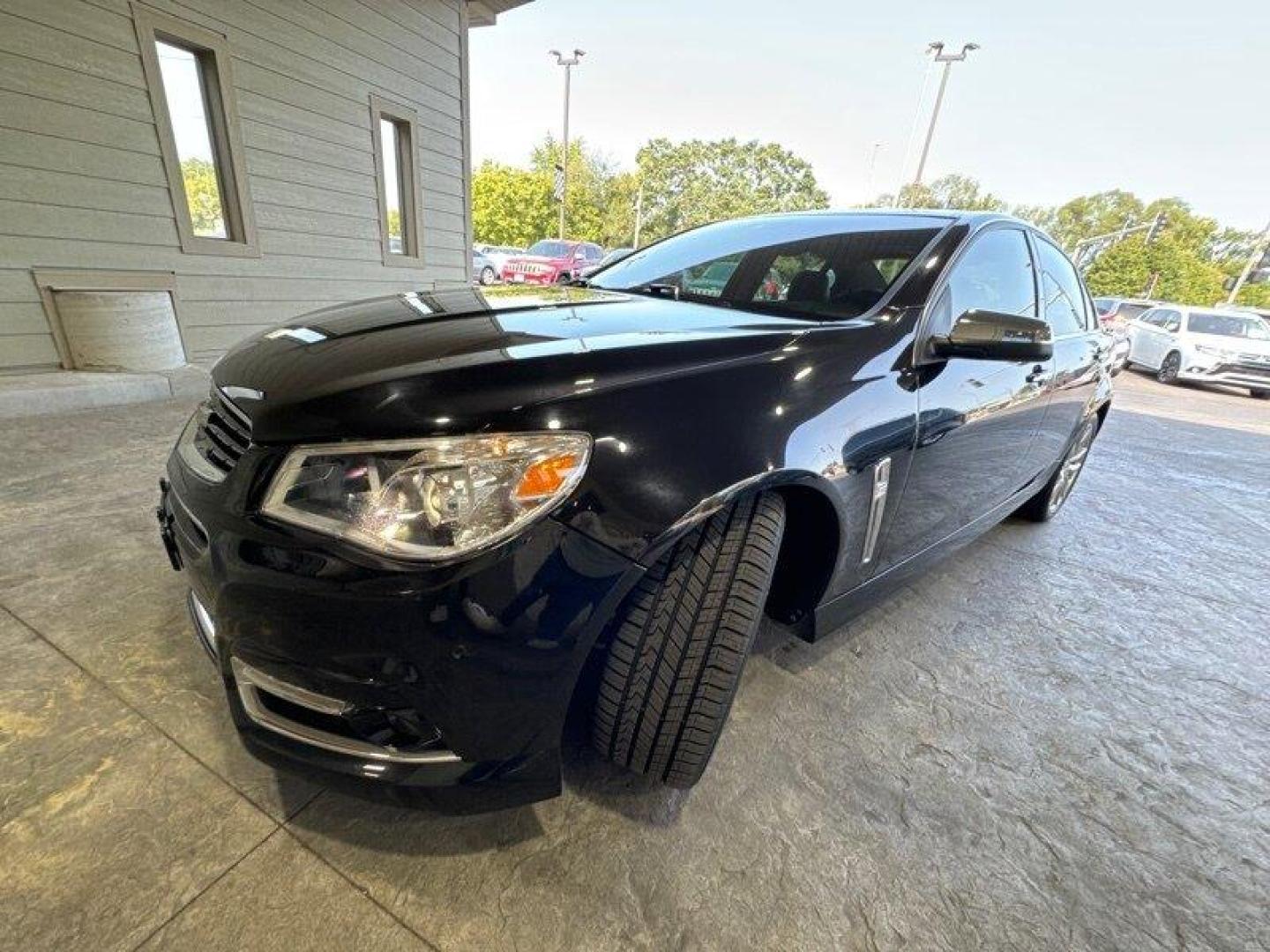 2014 Phantom Black Metallic Chevrolet SS (6G3F15RW5EL) with an 6.2L V8 415hp 415ft. lbs. engine, Automatic transmission, located at 25355 Eames Street, Channahon, IL, 60410, (815) 467-1807, 41.429108, -88.228432 - Looking for a high-performance sports sedan that'll have your heart racing with every drive? Look no further than this 2014 Chevrolet SS! Powered by a 6.2L V8 engine that cranks out a heart-pumping 415 horsepower and 415 foot-pounds of torque, this vehicle is a true beast on the road. But the powe - Photo#7