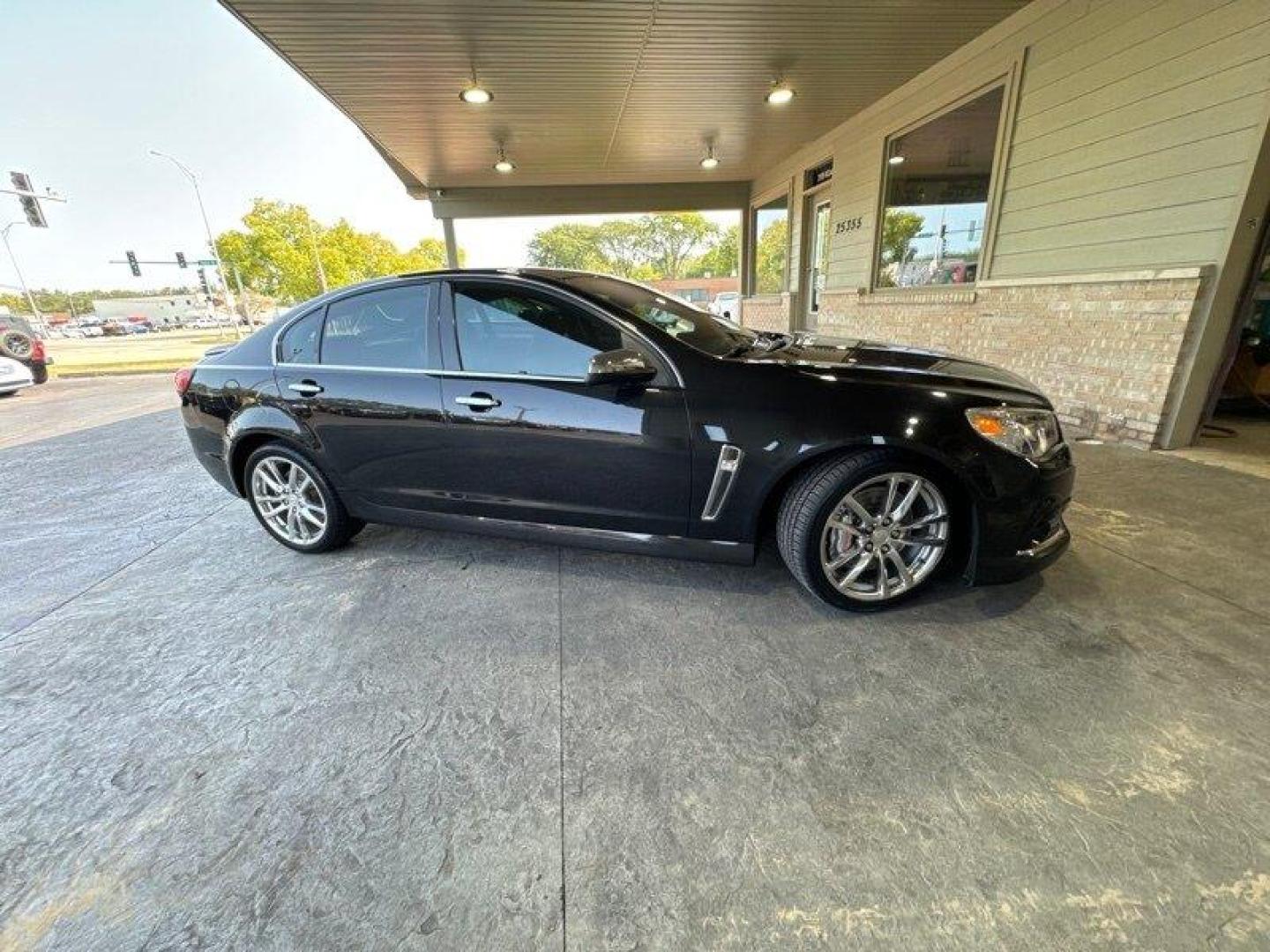 2014 Phantom Black Metallic Chevrolet SS (6G3F15RW5EL) with an 6.2L V8 415hp 415ft. lbs. engine, Automatic transmission, located at 25355 Eames Street, Channahon, IL, 60410, (815) 467-1807, 41.429108, -88.228432 - Looking for a high-performance sports sedan that'll have your heart racing with every drive? Look no further than this 2014 Chevrolet SS! Powered by a 6.2L V8 engine that cranks out a heart-pumping 415 horsepower and 415 foot-pounds of torque, this vehicle is a true beast on the road. But the powe - Photo#1